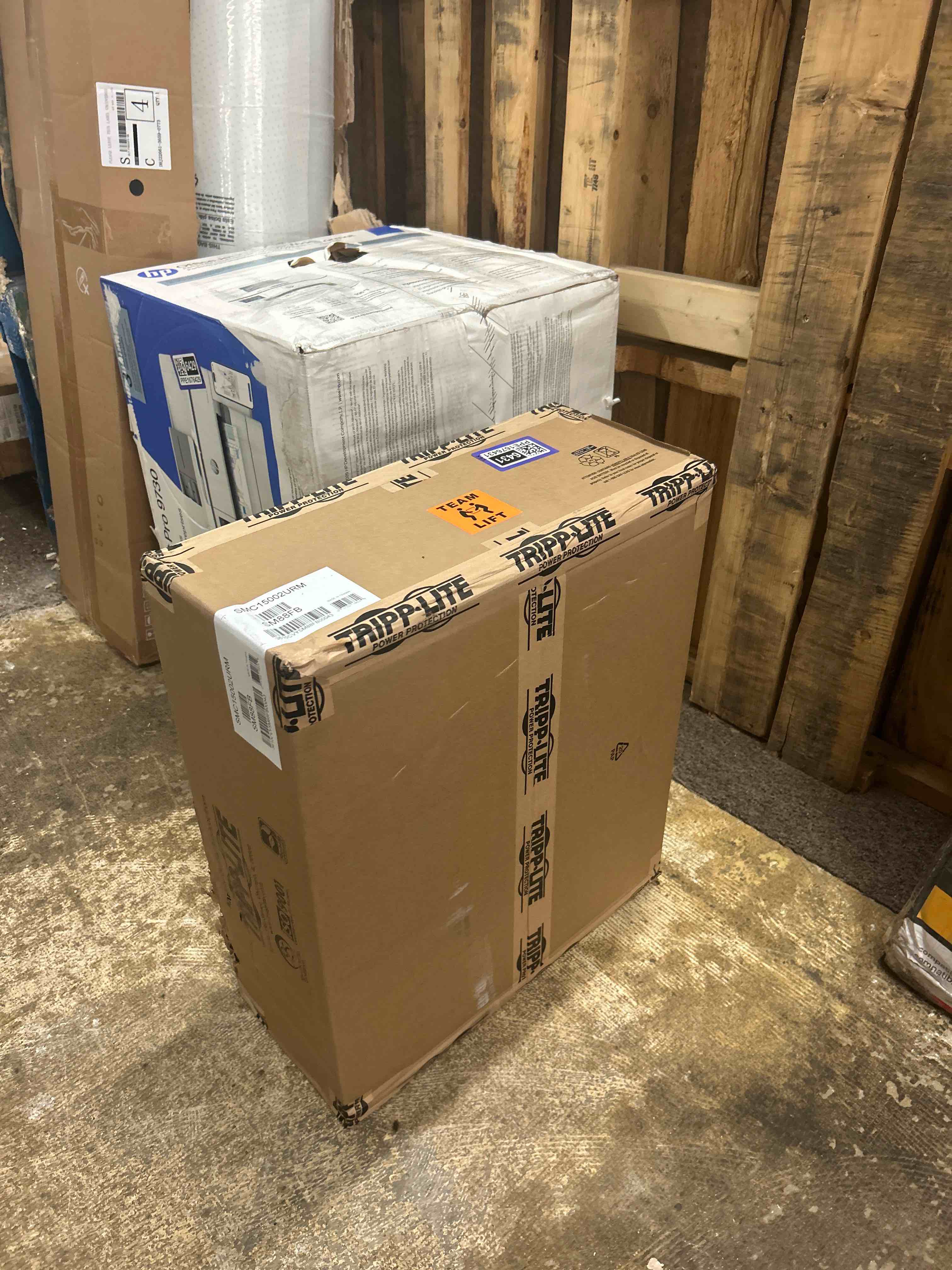 Condition photo showing New/Like New for tripp lite smc15002urm 1500va rack mount ups battery backup, pure sine wave, 1000w, 8 outlets, 2u rackmount, lcd, avr, uninterruptible power