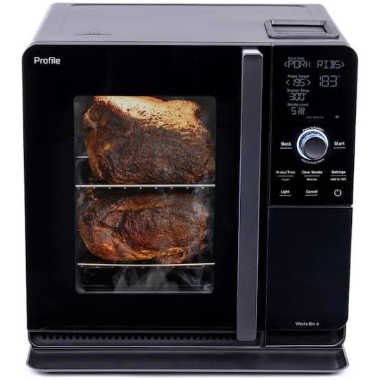 Condition photo showing New/Like New for ge profile smart indoor pellet smoker, with active smoke filtration, 5 smoke control settings, wifi connected, electric, countertop bbq appliance, black