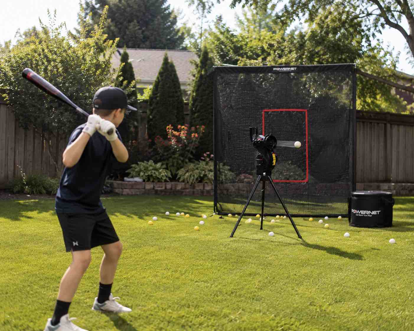 Condition photo showing New/Like New for powernet launch f-lite softball & baseball pitching machine, dimpled practice balls, bucket of baseballs, coaching bucket bundle for pitching machine, baseball training equipment