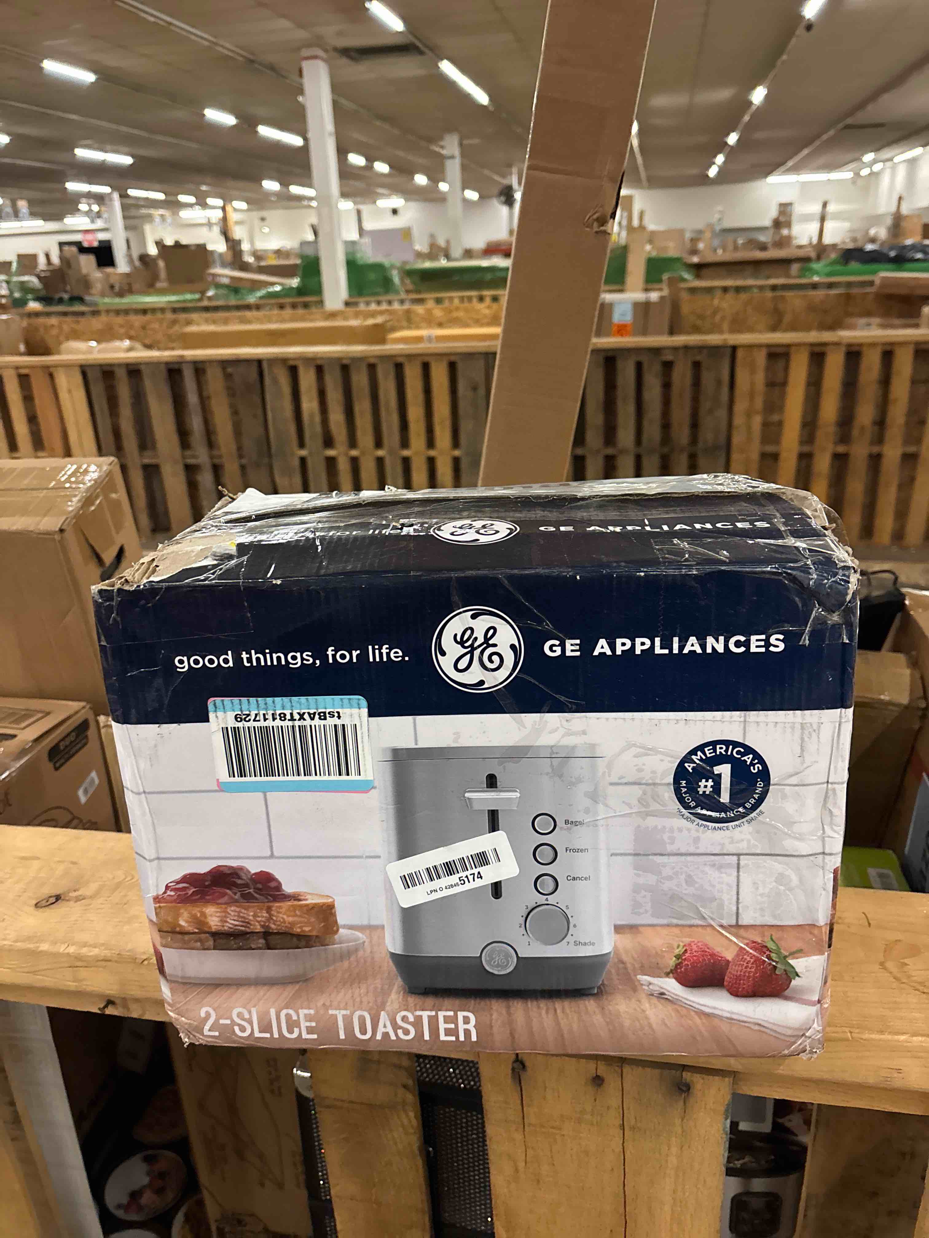 Condition photo showing New/Like New for GE 2 Slice Stainless Steel Toaster, Extra Wide Slots for Toasting Bagels, Breads, Waffles & More, 7 Adjustable Shade Settings, Removable Crumb Tray, Countertop Kitchen Essentials, 850 Watts 2-Slice Stainless Steel