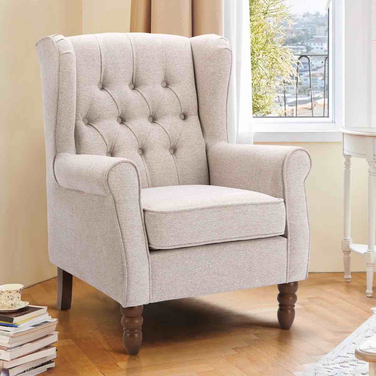 button-tufted small wingback accent chair with rolled arm and thick padded cushion