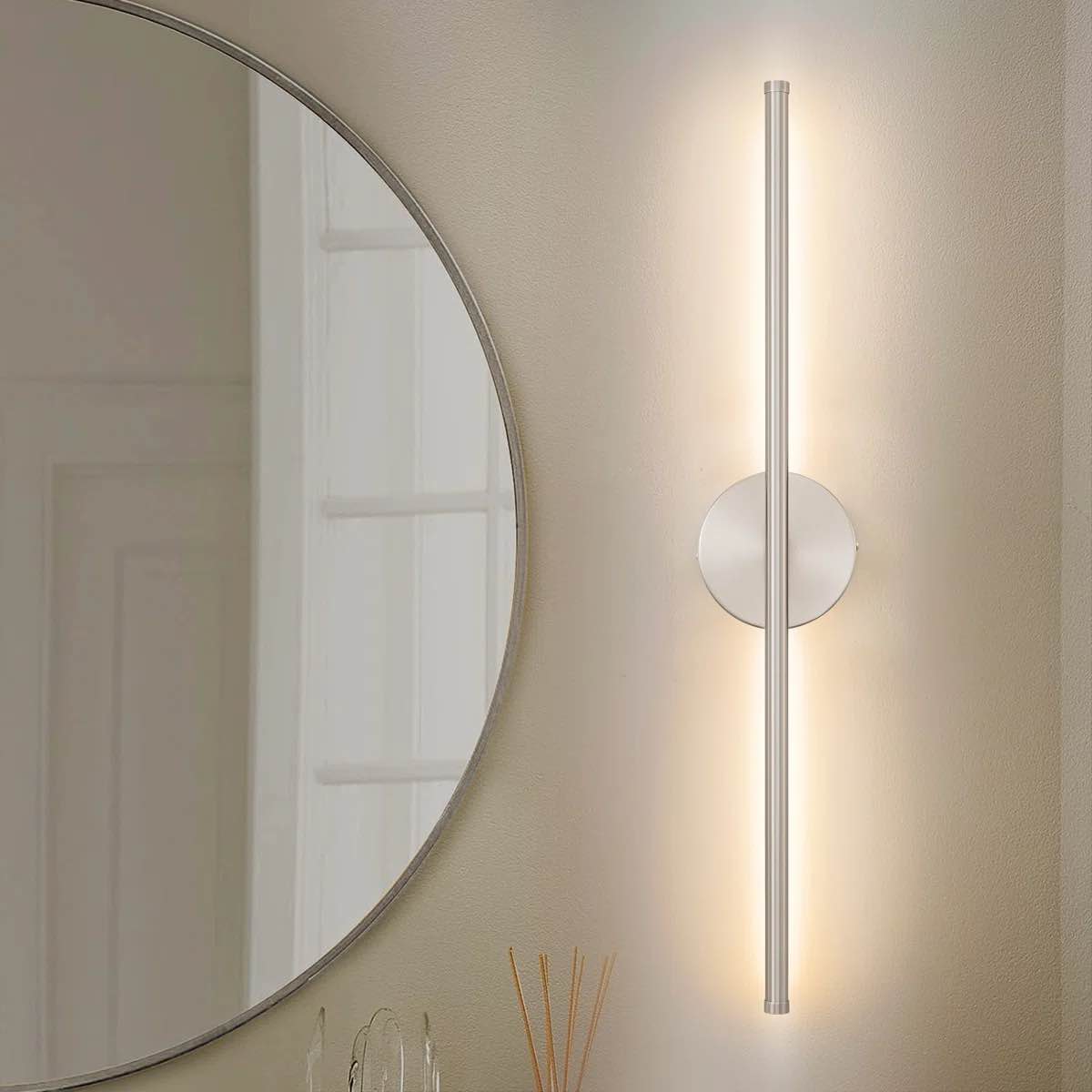 led ceiling light fixture with a round brushed metal canopy.