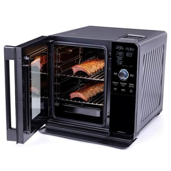 Condition photo showing New/Like New for ge profile smart indoor pellet smoker, with active smoke filtration, 5 smoke control settings, wifi connected, electric, countertop bbq appliance, black