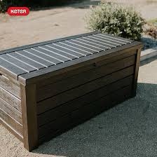 keter westwood 150 gallon deck box organizer, doubles as 2-person bench seat, brown - large resin outdoor storage and seating with lockable lid for garden, pool, and patio