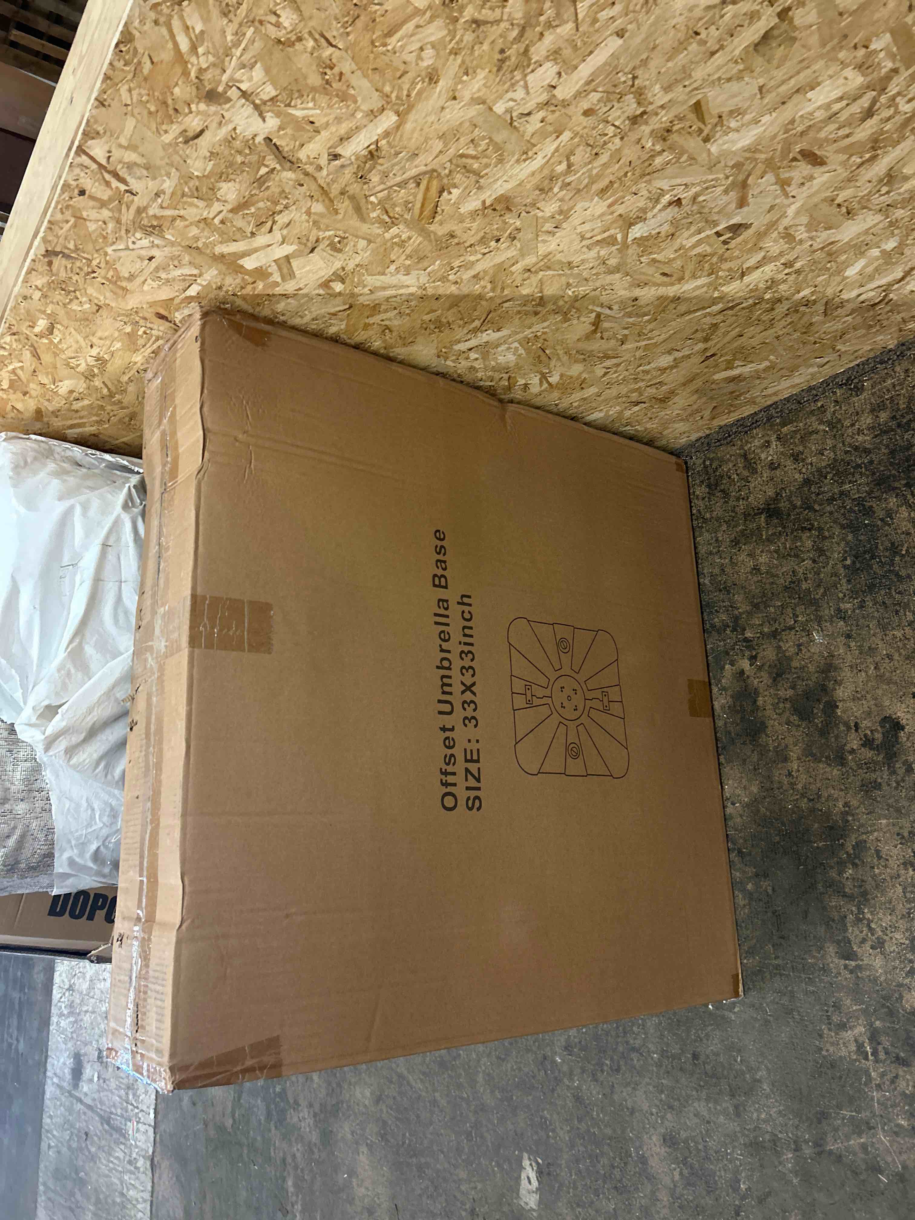 Condition photo showing New/Like New for yssoa offset patio umbrella base with wheels, sand(410 lbs)/water(220 lbs) filled, heavy duty market cantilever umbrellas stand, 33"x33"x6.7"