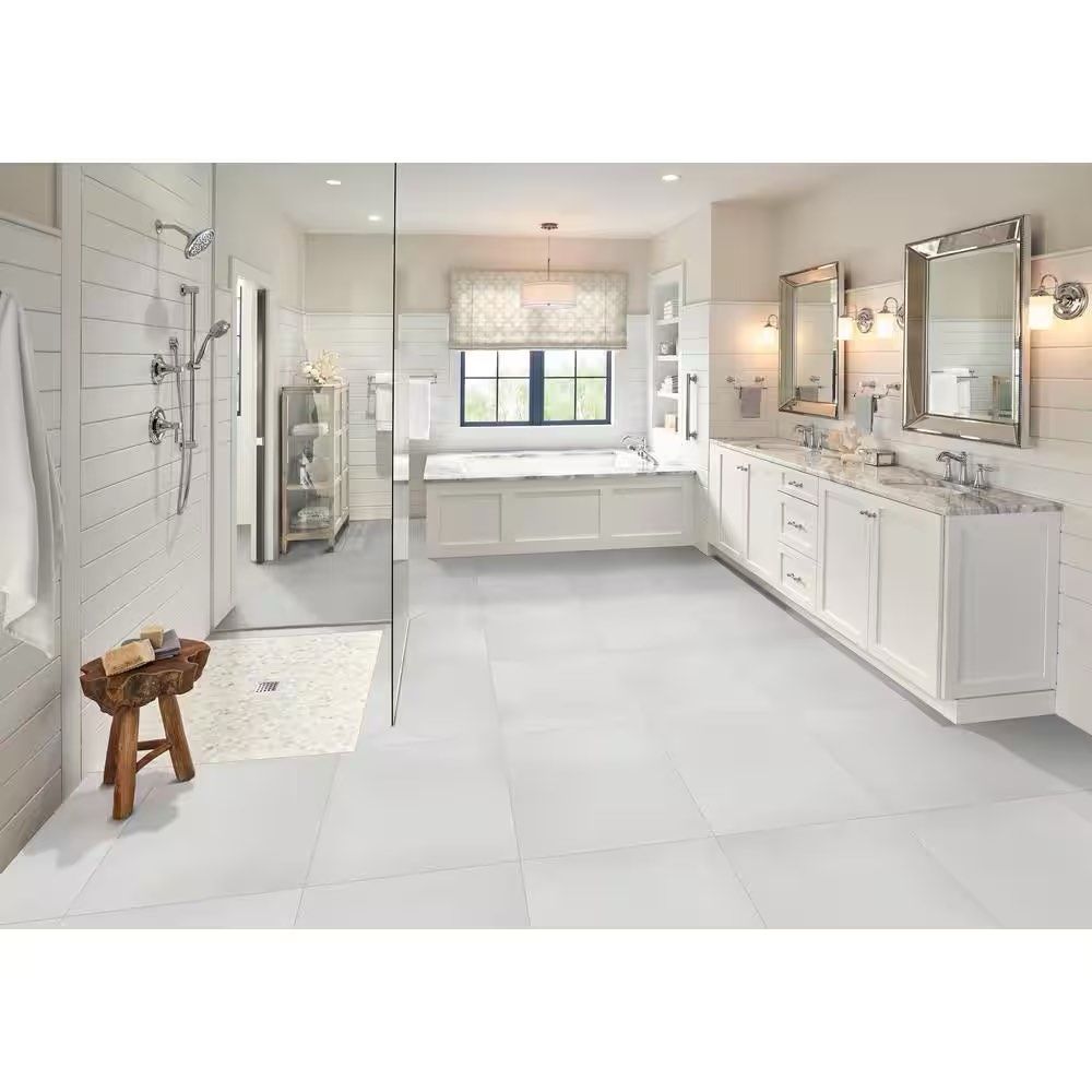 Condition photo showing New/Like New for white 24 in. x 24 in. polished porcelain floor and wall tile (2 24 x 24” tiles)