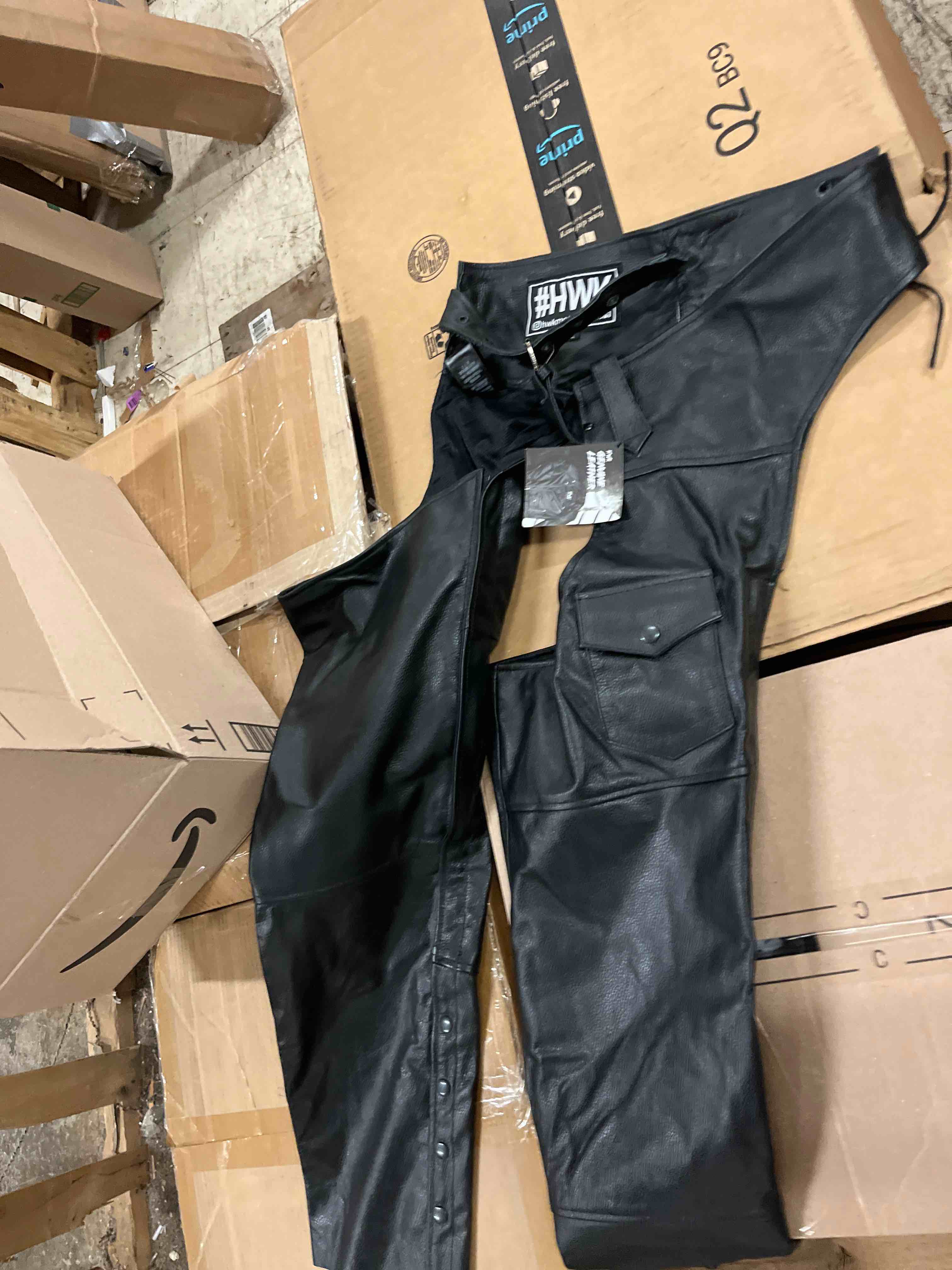 Condition photo showing New/Like New for hwk motorcycle leather chaps for men and women, black motorcycle chaps for road rash protection and all-weather comfort