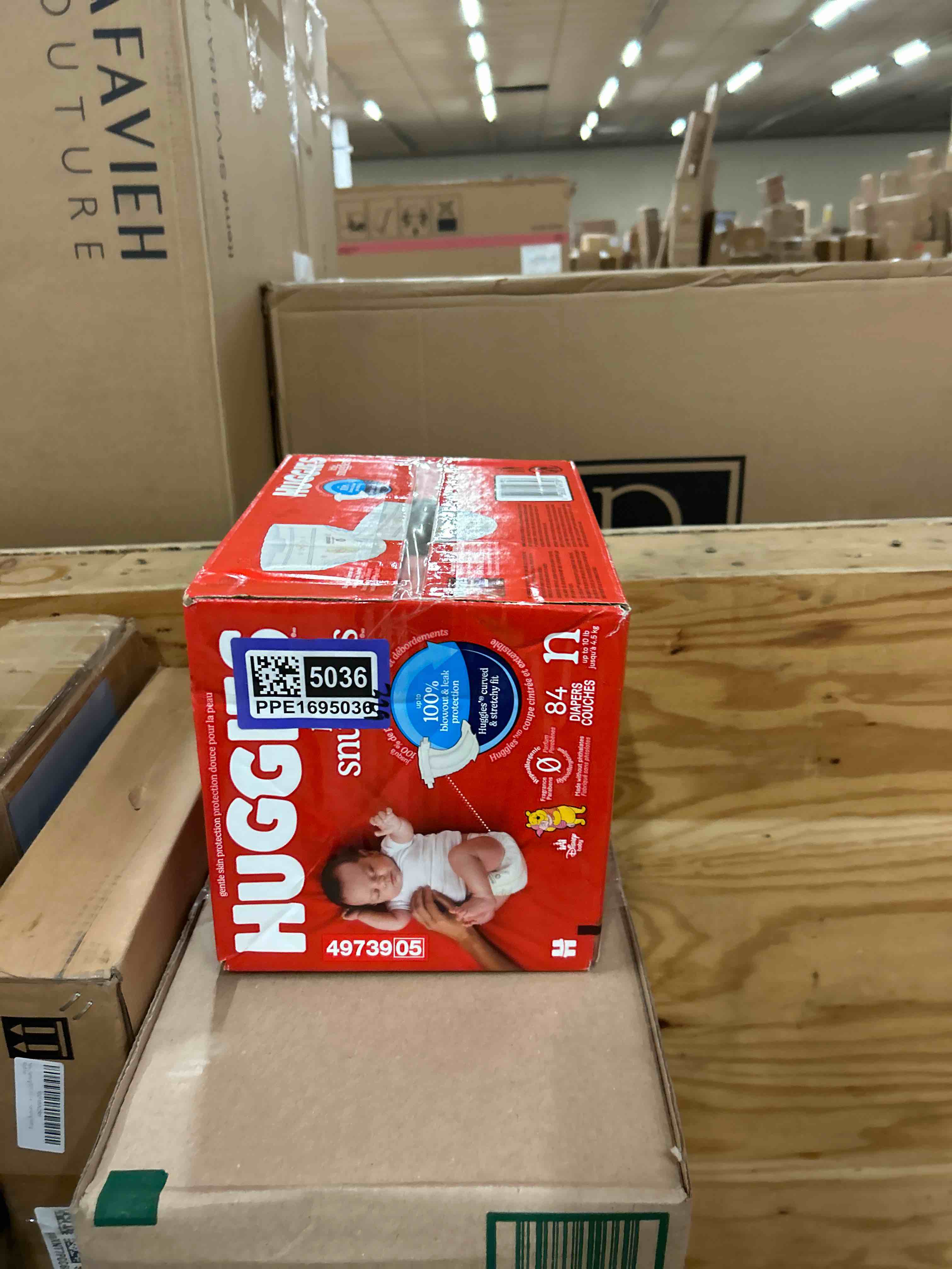 Condition photo showing New/Like New for Huggies Little Snugglers Diapers - Newborn - 84ct