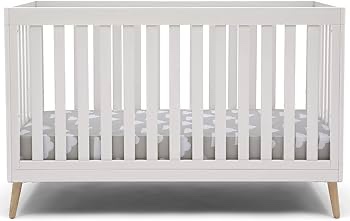 Condition photo showing New/Like New for Delta Children Essex 4-in-1 Convertible Baby Crib  Bianca White/Natural Legs