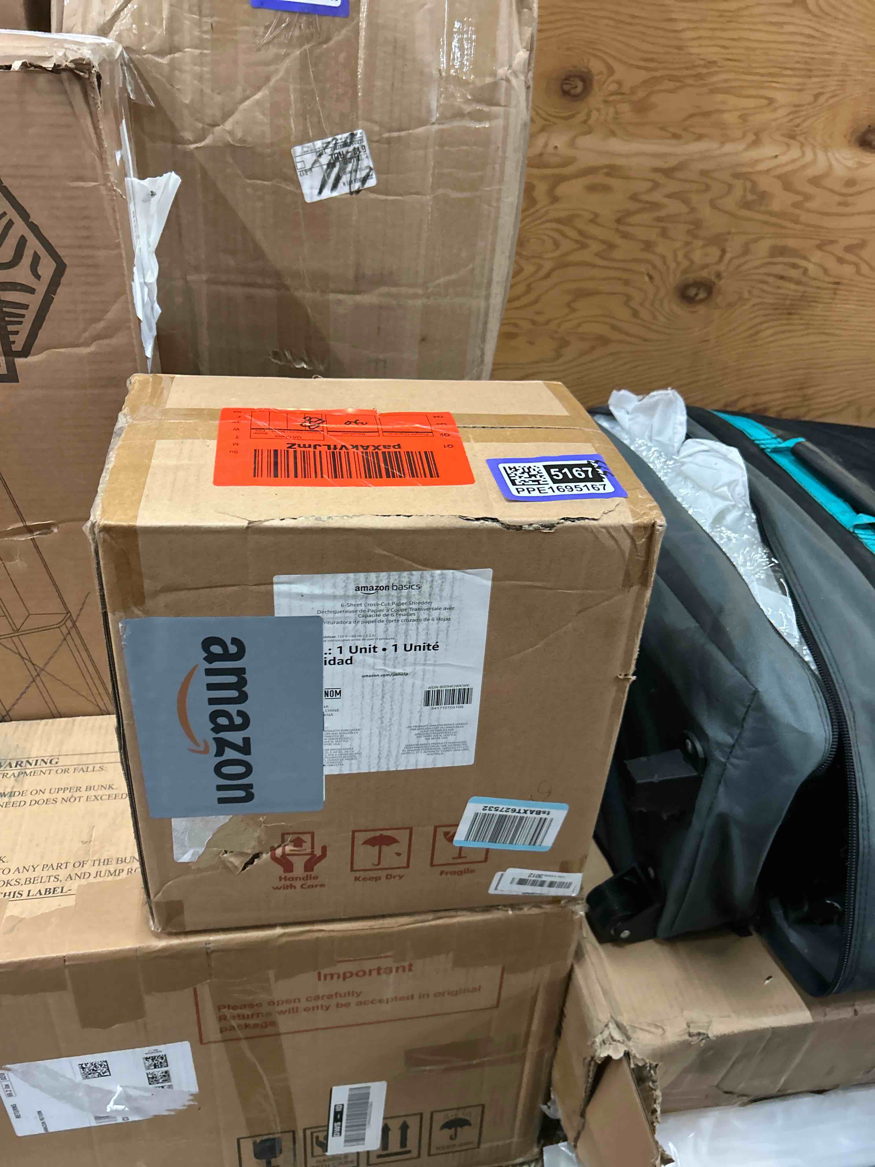 Condition photo showing New/Like New for Amazon Basics 6-Sheet Cross-Cut Paper and Credit Card Shredder with 3.8 Gallon Bin, Shreds Staples, Black