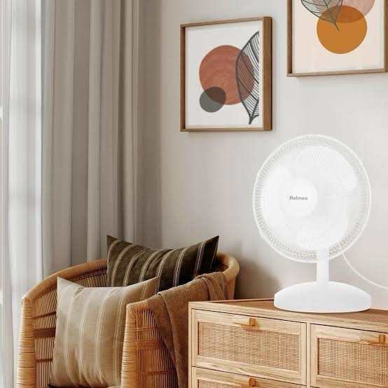 Condition photo showing New/Like New for HOLMES 12" Table Fan, 75° Oscillation, 3 Speeds, 15° Adjustable Head Tilt, Ideal for Home, Bedroom or Office, White
