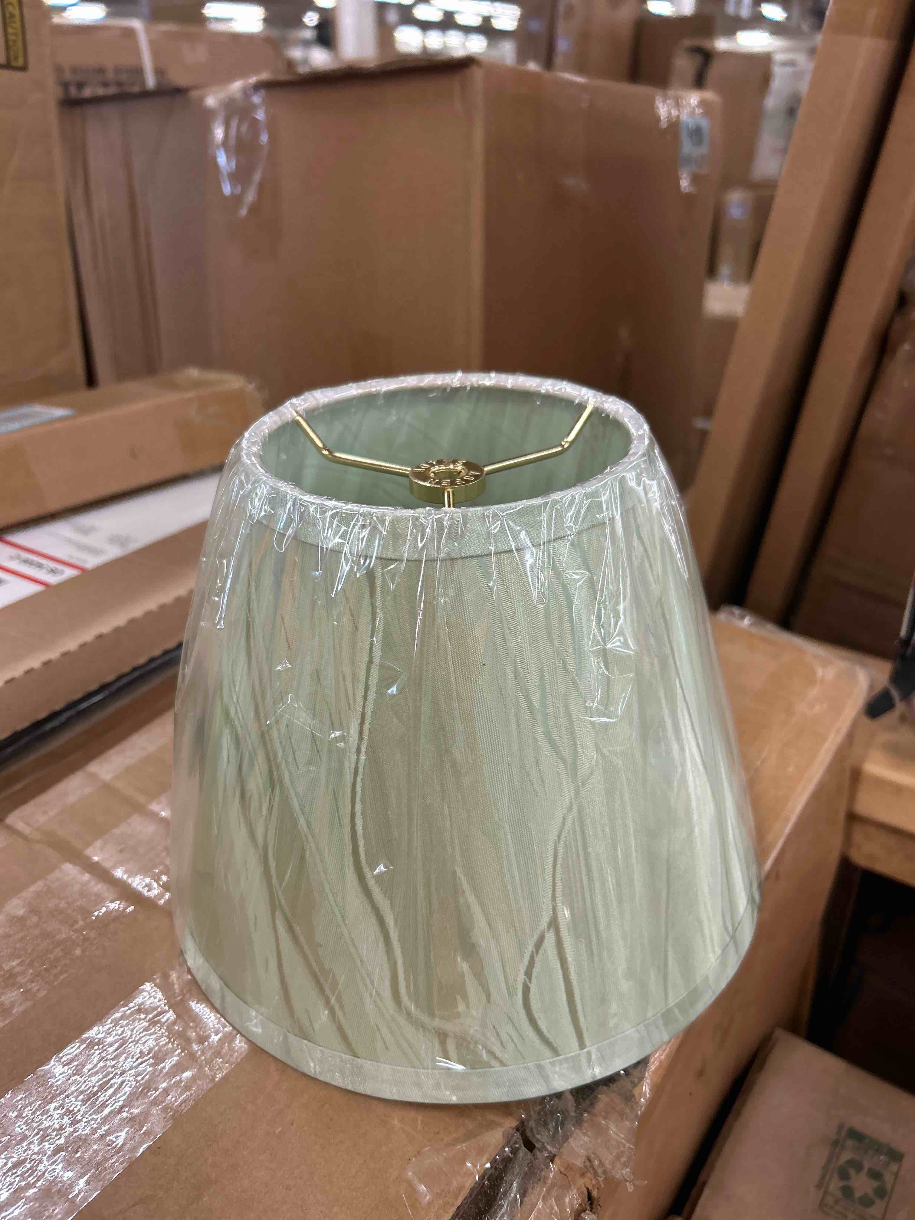 Condition photo showing New/Like New for Aspen Creative 32430A, Transitional Hardback Empire Shape Spider Construction Lamp Shade in Light Green, 9" wide (5" x 9" x 7")