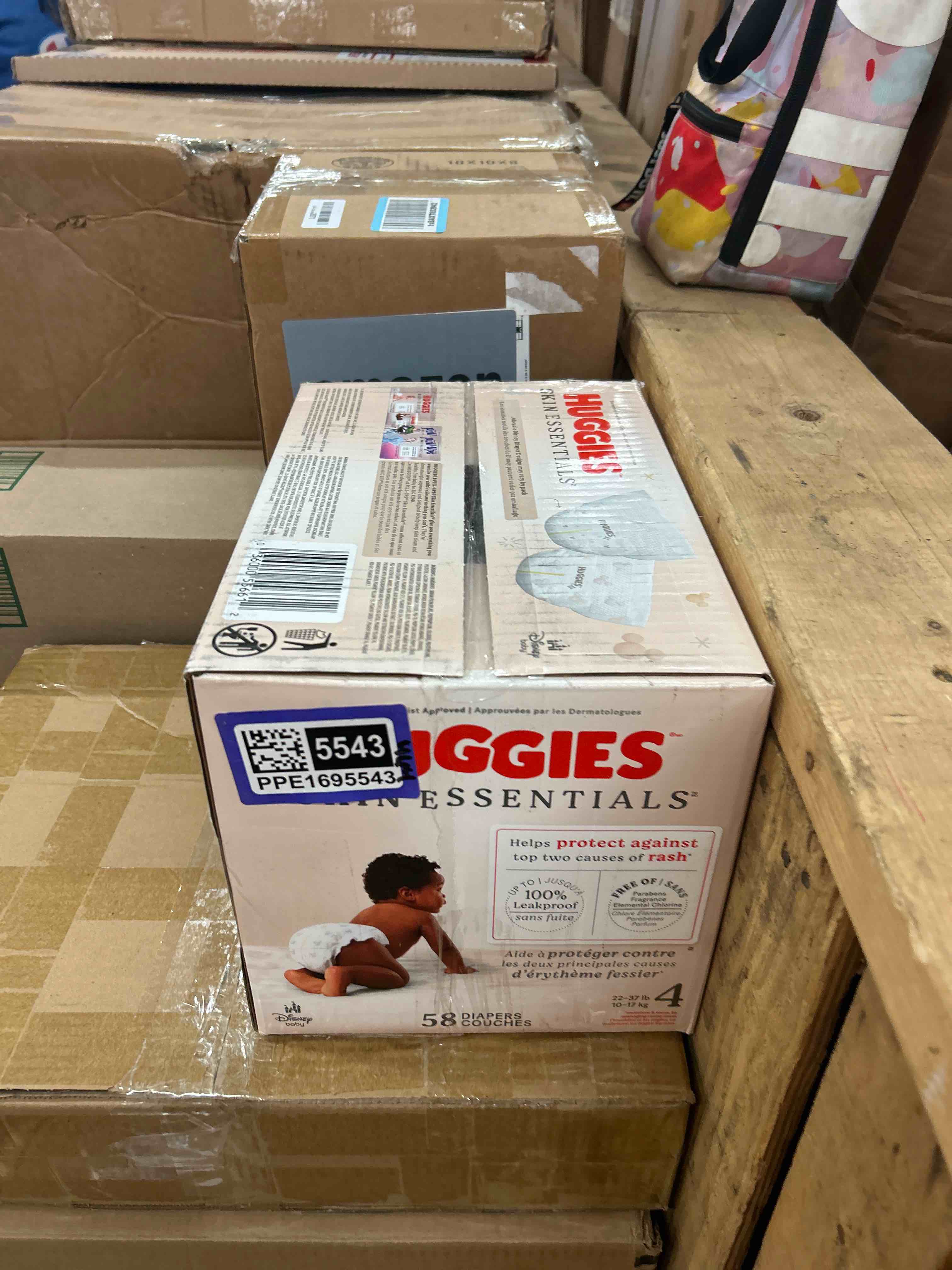 Condition photo showing New/Like New for Huggies Size 4 Diapers, Skin Essentials Baby Diapers, Size 4 (22-37 lbs), 58 Count, Packaging May Vary