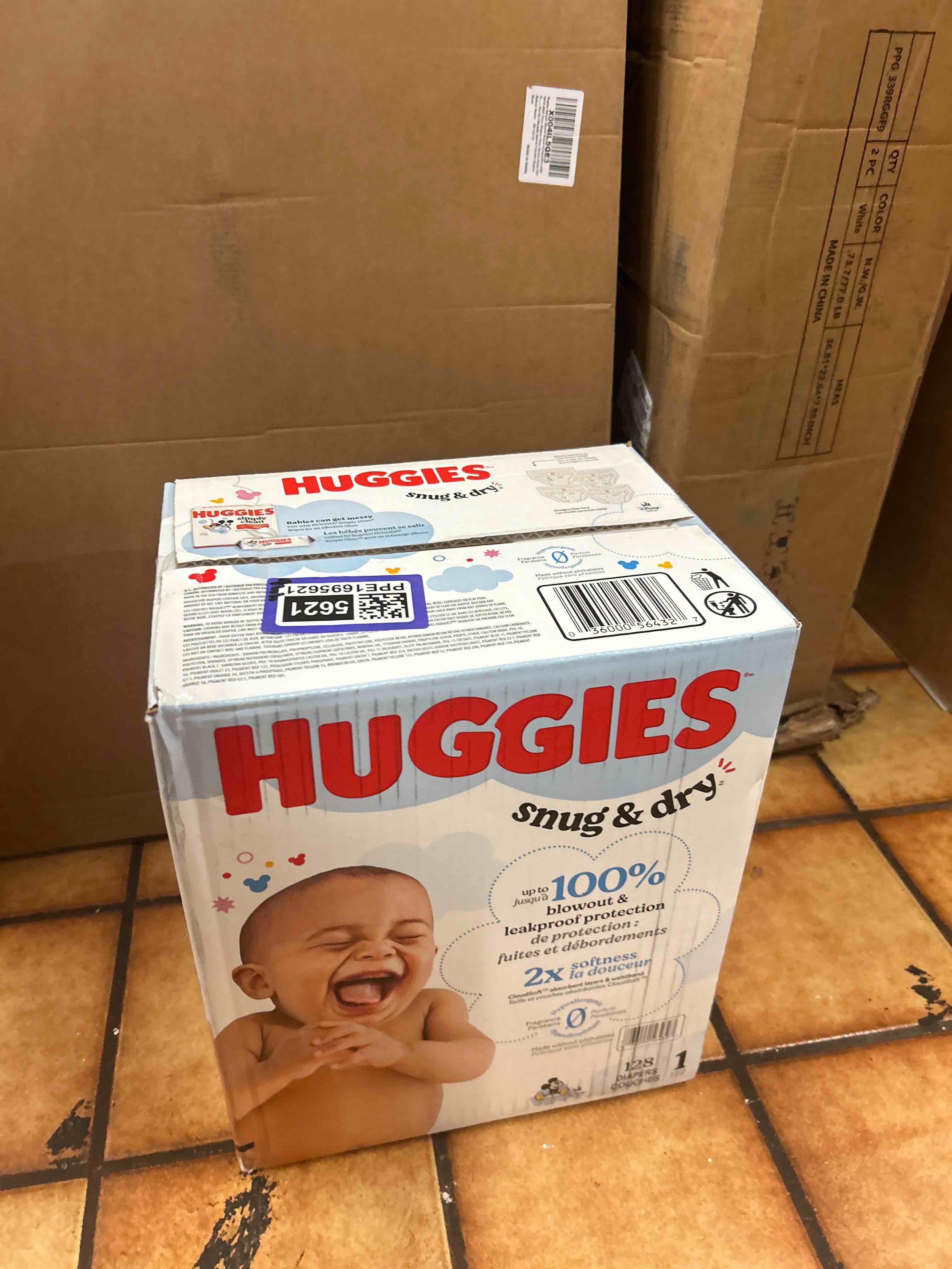 Condition photo showing New/Like New for Huggies Size 1 Diapers, Snug & Dry Newborn Diapers, Size 1 (8-14 lbs), 128 Count, Packaging May Vary