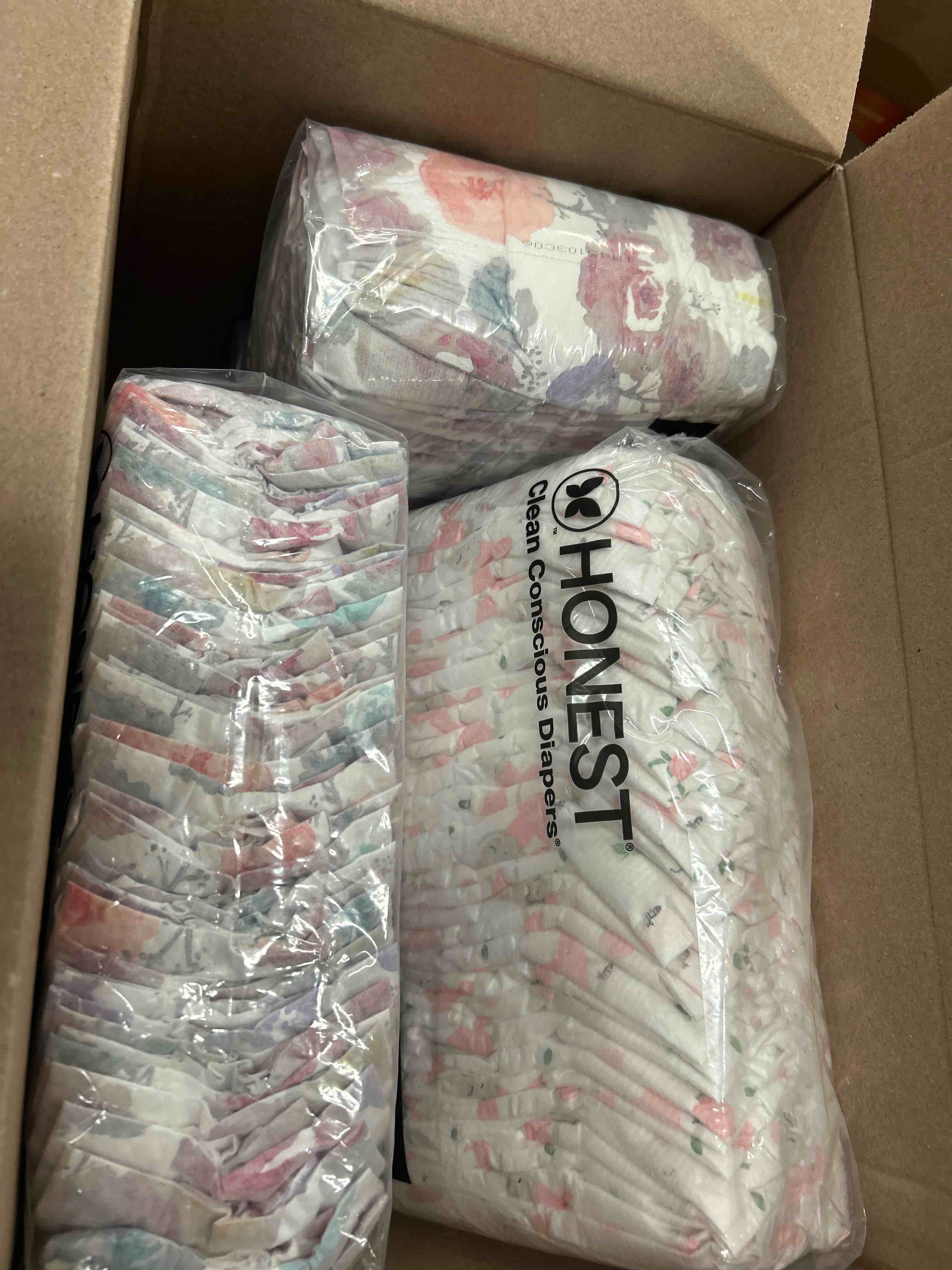 Condition photo showing New/Like New for The Honest Company Comfort Dry Disposable Diapers for Sensitive Skin, Hypoallergenic, Fragrance-Free, Rose Blossom + Tutu Cute, Super Club Box, Size 2 (12-18 lbs), 124 Count
