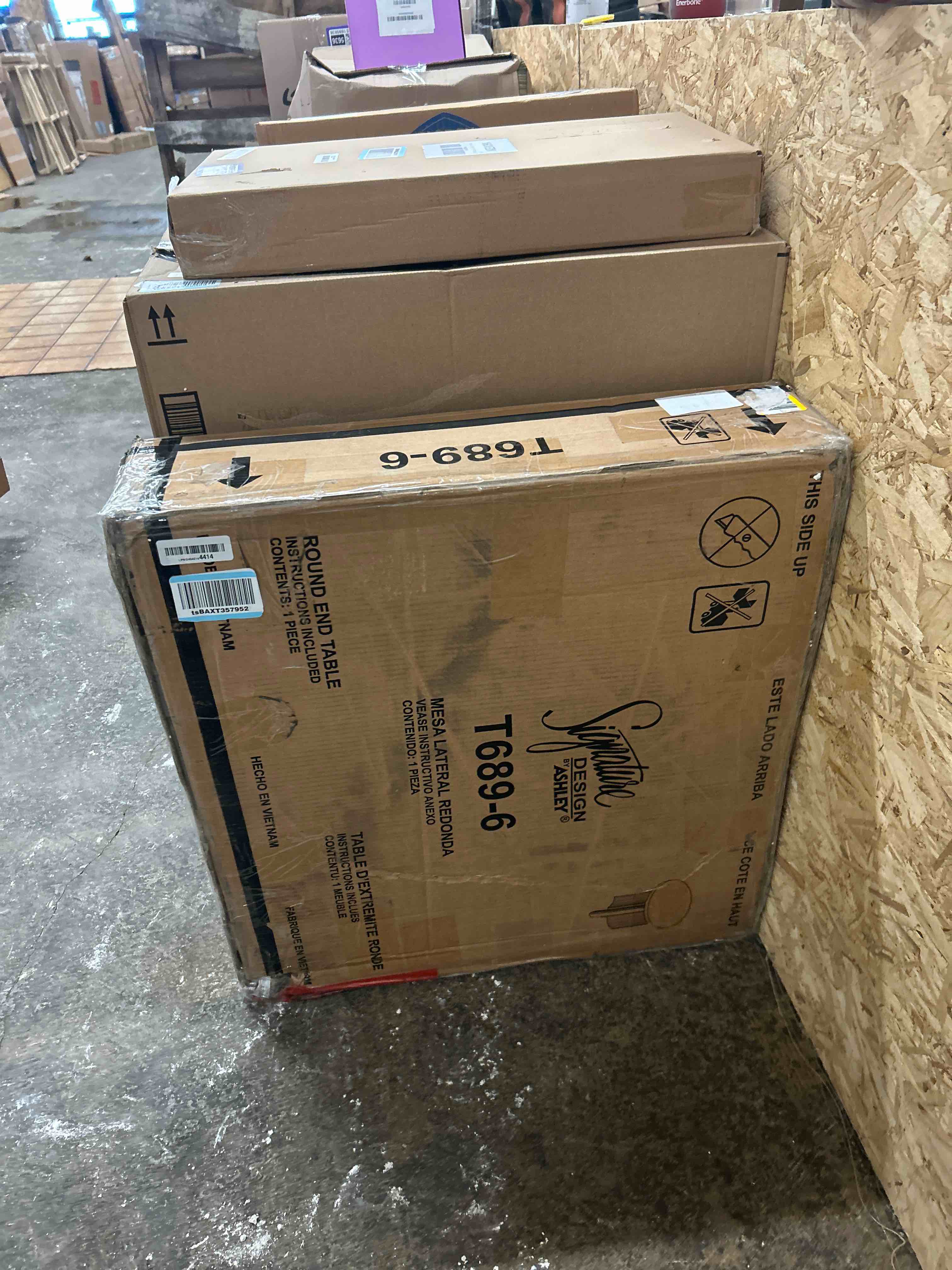 Condition photo showing New/Like New for Signature Design by Ashley Korestone Contemporary End Table with Curved Legs, Dark Brown