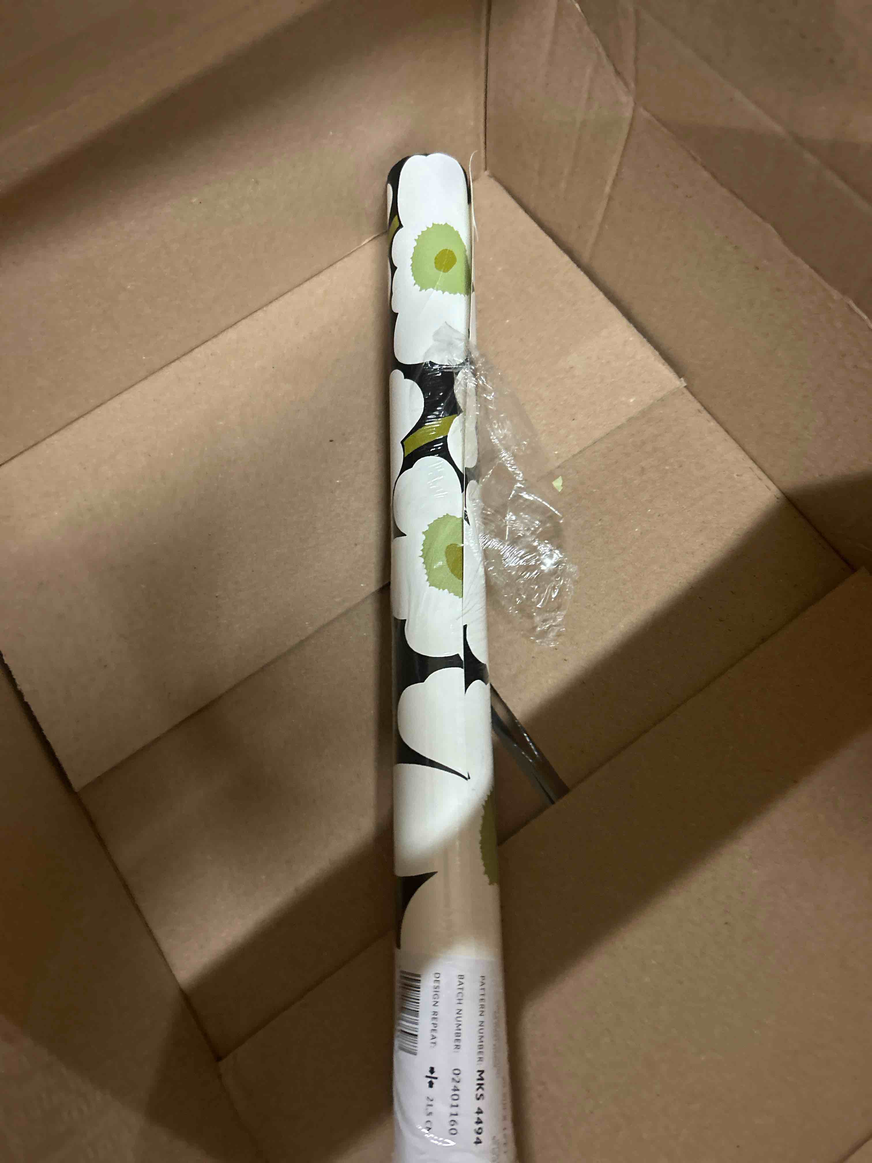 Condition photo showing New/Like New for Marimekko Black Pieni Unikko Peel & Stick Wallpaper (MKS4494)