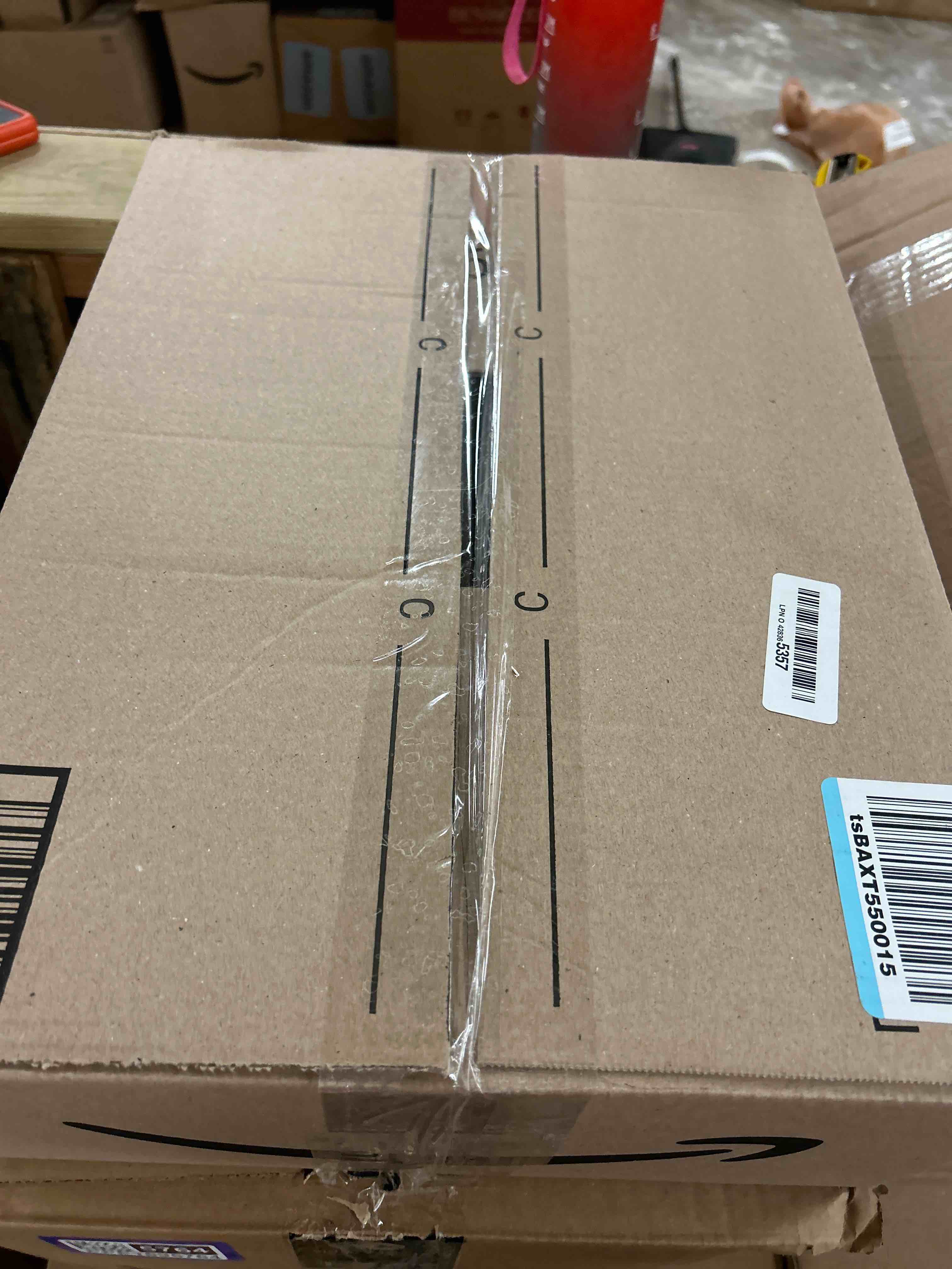 Condition photo showing New/Like New for Lodge Seasoned Cast Iron Skillet - Quality Frying Pan for the Stove, Oven, Grill & Campfire - Includes Silicone Hot Handle Holder - Non-Toxic, Nonstick & Long-Lasting - 12 Inches