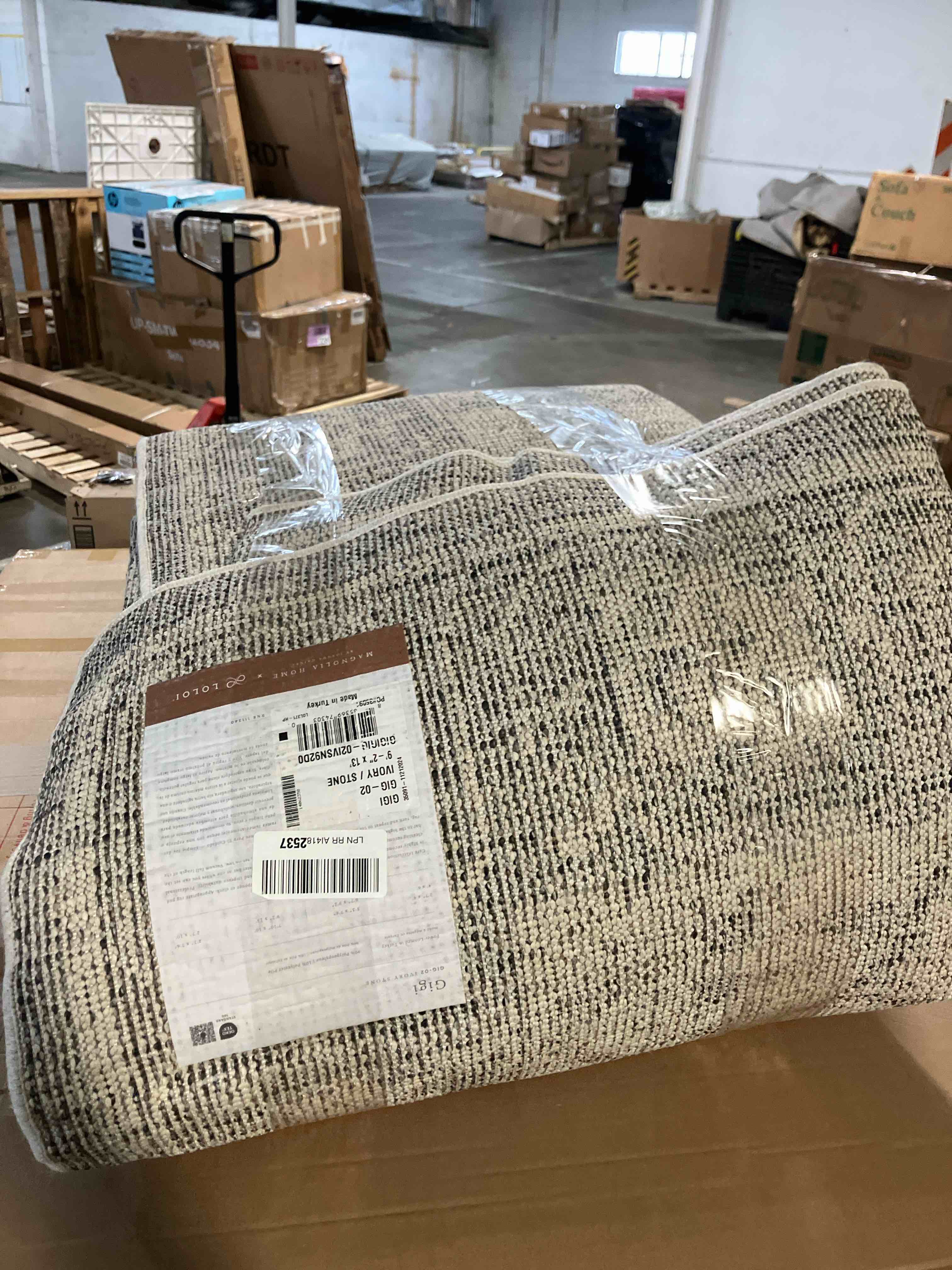 Condition photo showing New/Like New for Loloi Magnolia Home by Joanna Gaines Gigi Collection GIG-02 Ivory/Stone 9'-2" x 13' Area Rug Rectangular Ivory / Stone 9'-2" x 13'