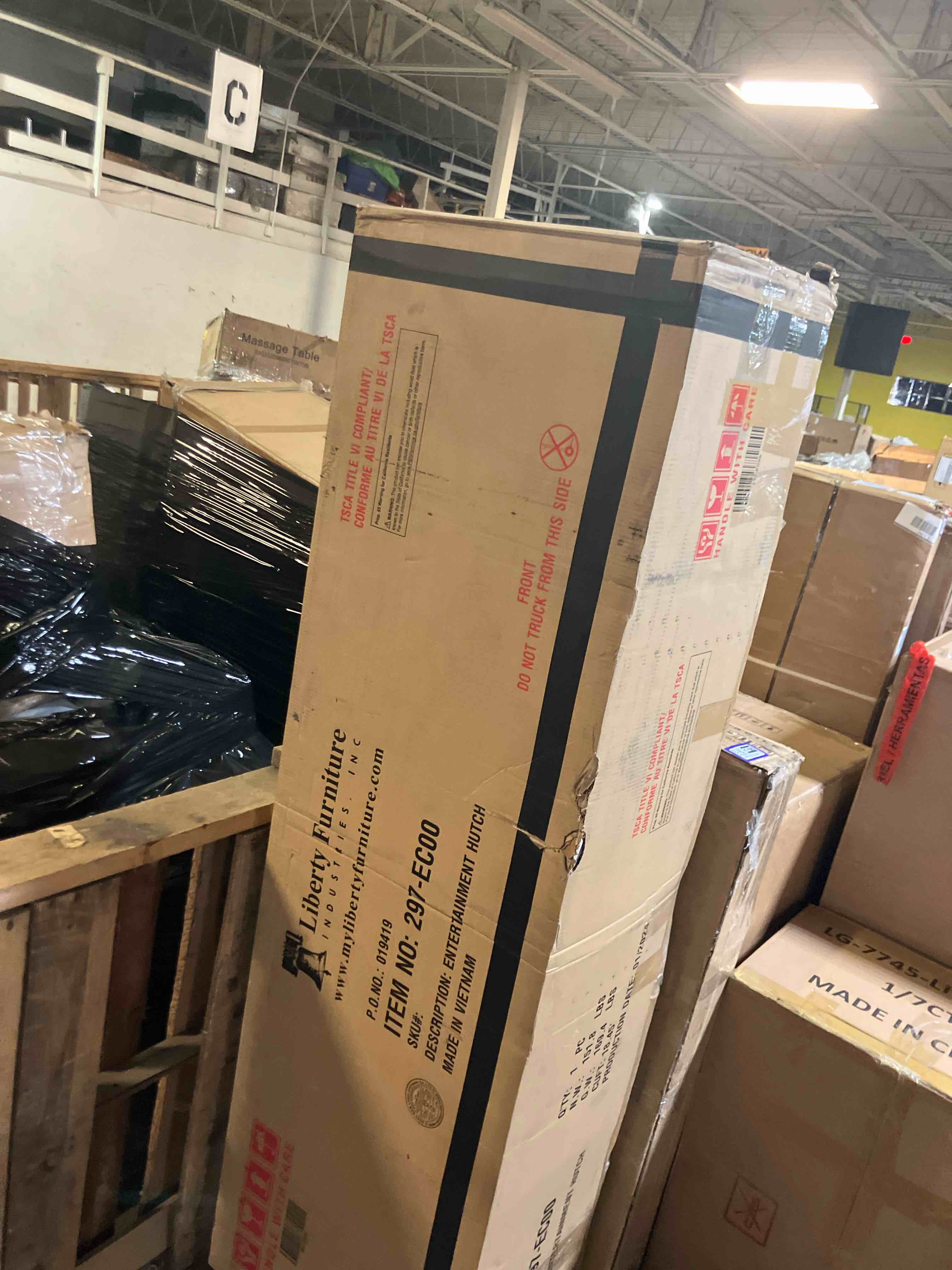 Condition photo showing As Is for Trelawny 78" Entertainment Console - Saddle Brown (Incomplete missing box 2)