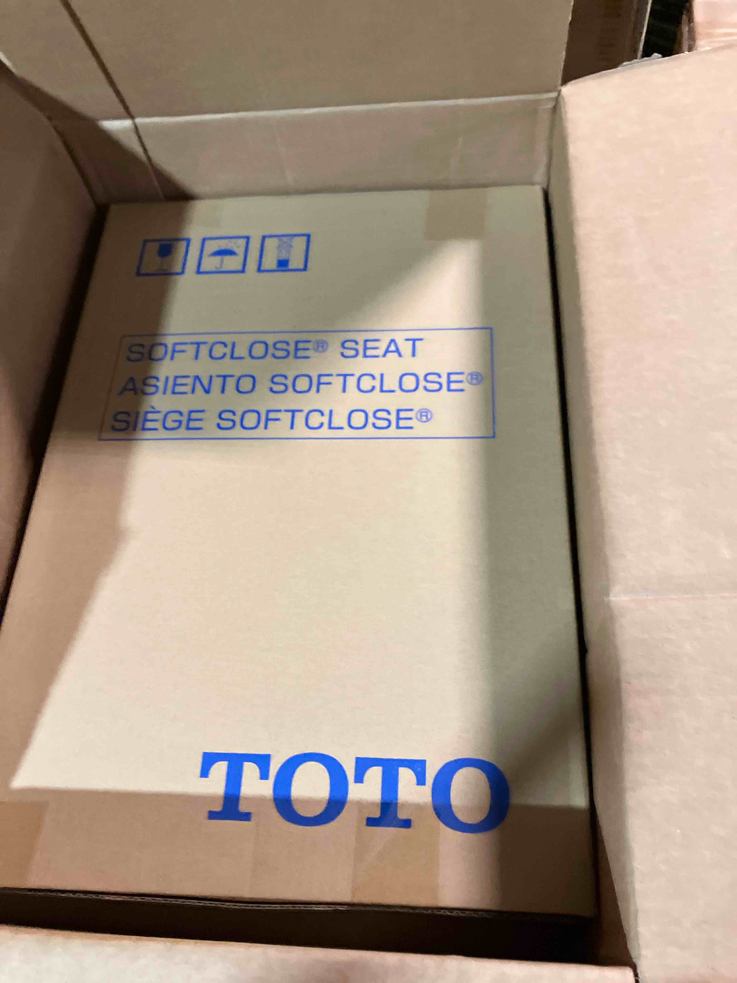 Condition photo showing New/Like New for TOTO SoftClose Slow Close Elongated Toilet Seat and Lid, Cotton White - SS124#01