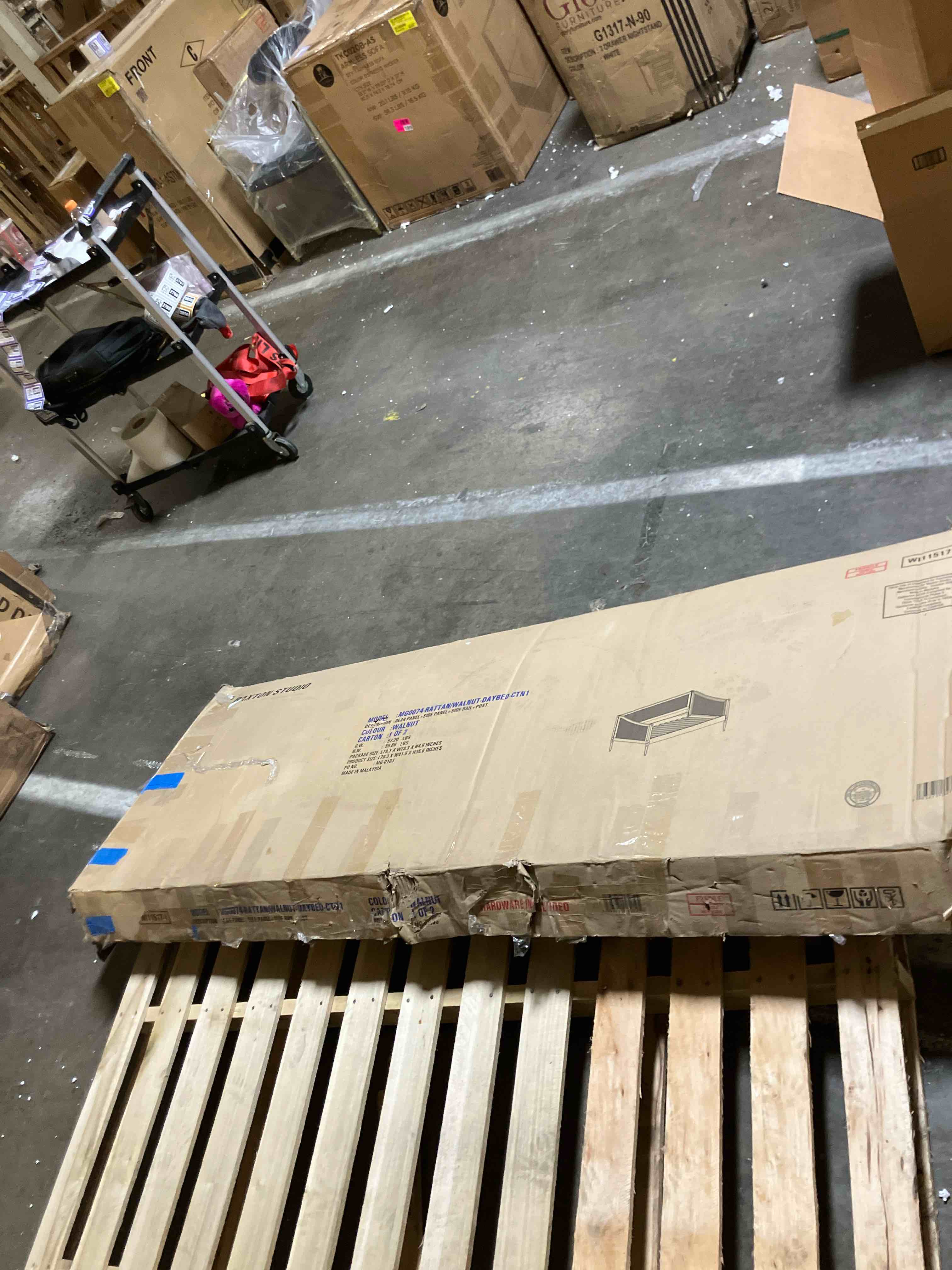 Condition photo showing As Is for Ogden Mid-Century Modern Walnut Brown Finished Wood and Synthetic Rattan Twin Size Daybed (Incomplete box 1/2)