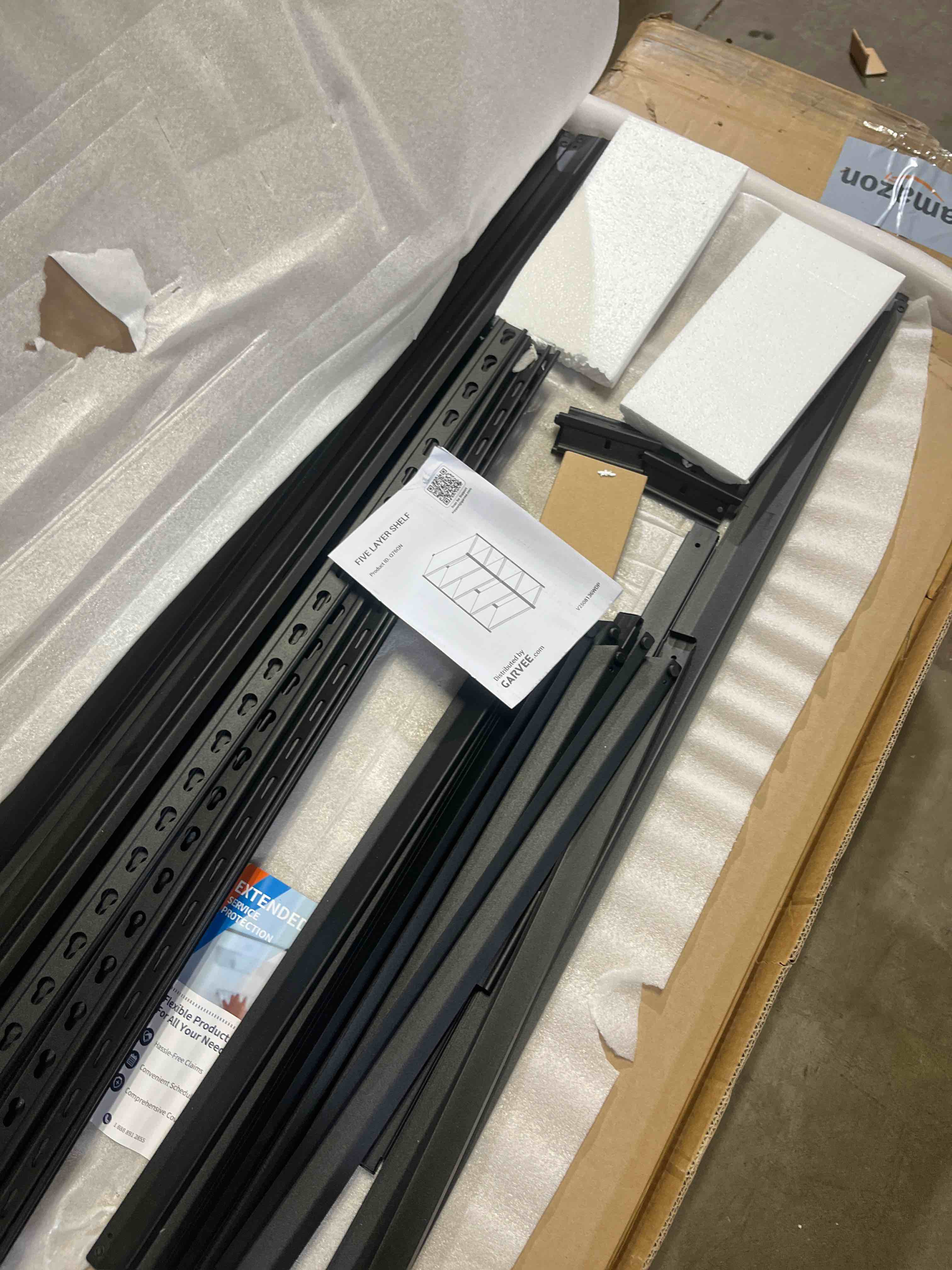 Condition photo showing Good Condition for Garvee Storage Shelves, 3000 lbs, 5 Tier Heavy Duty Garage Shelving, 24" D x 48" W x 72" H Adjustable Metal Shelves for Industrial Shelving Unit Utility Shelf, for Kitchen, Warehouse, Basement, Black Black 24" D x 48" W x 72" H