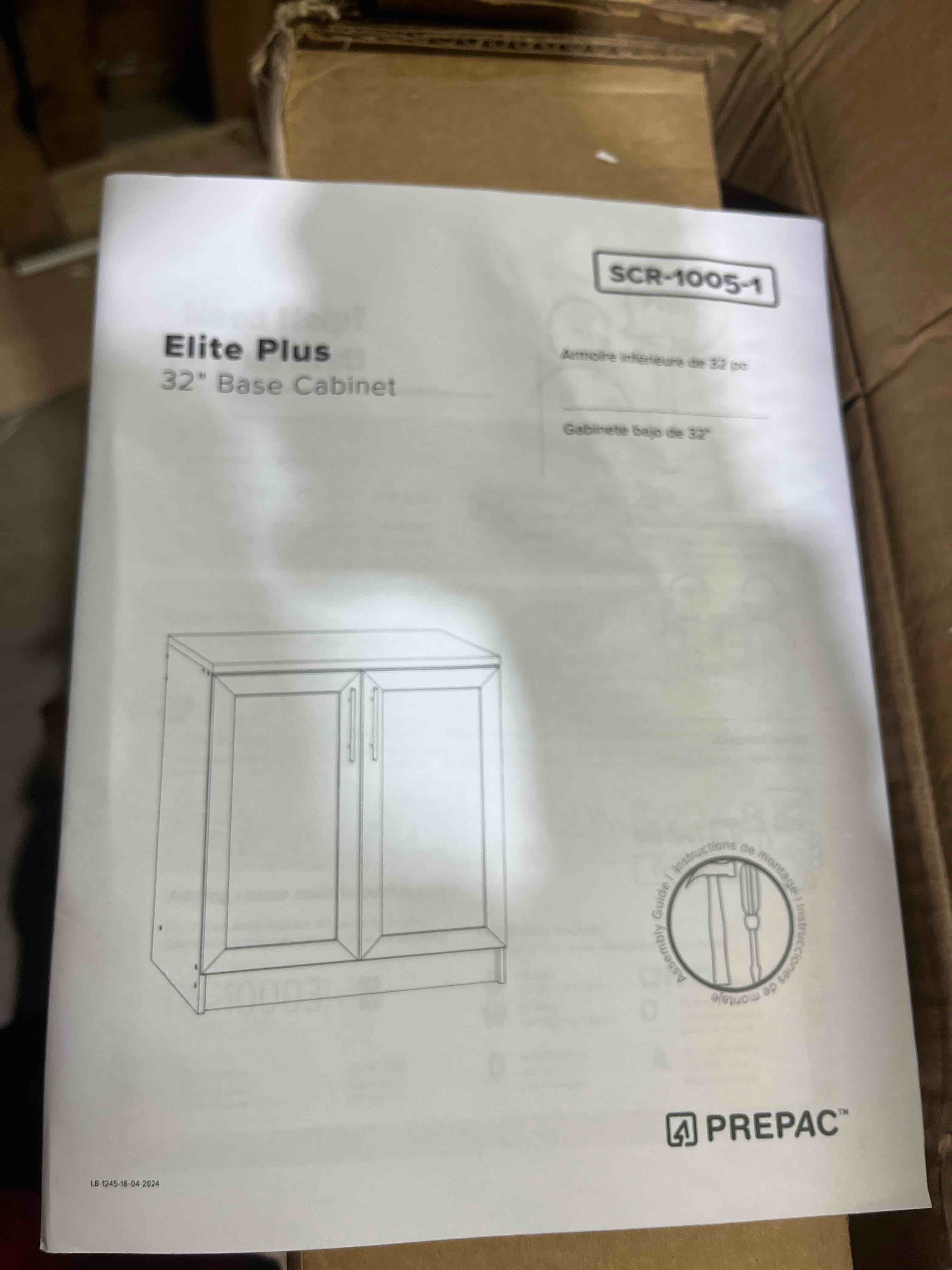 Condition photo showing New/Like New for Prepac Elite 32" W Storage Cabinet with Doors and Shelves, White Garage Cabinet, Bathroom Storage with 1 Adjustable Shelf 24.5" D x 32" W x 36" H, WSCR-1005-1 Lower Cabinet 24.5" D x 32" W x 36" H