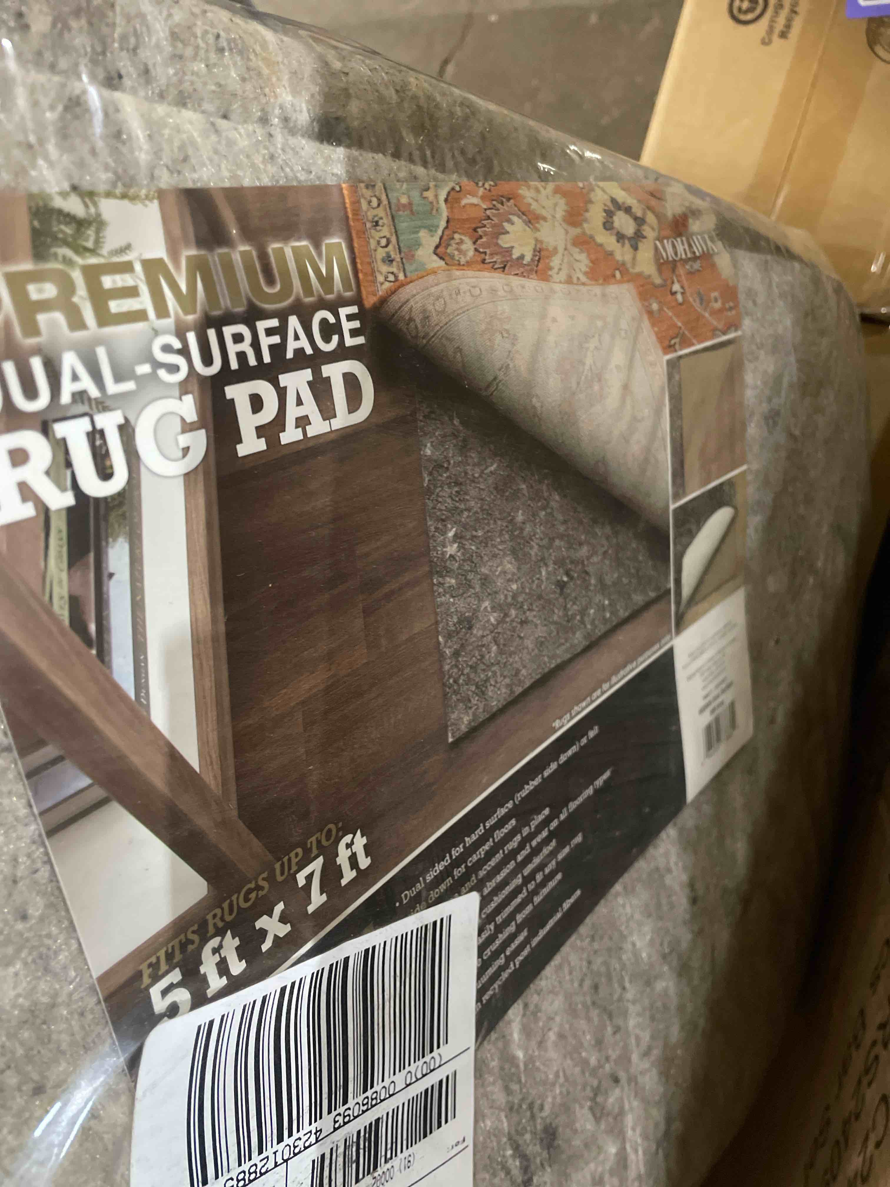 Condition photo showing New/Like New for mohawk home 5' x 7' premium luxury non slip rug pad 1/4 thick dual surface felt + rubber gripper - safe for all floors, synthetic fiber, grey