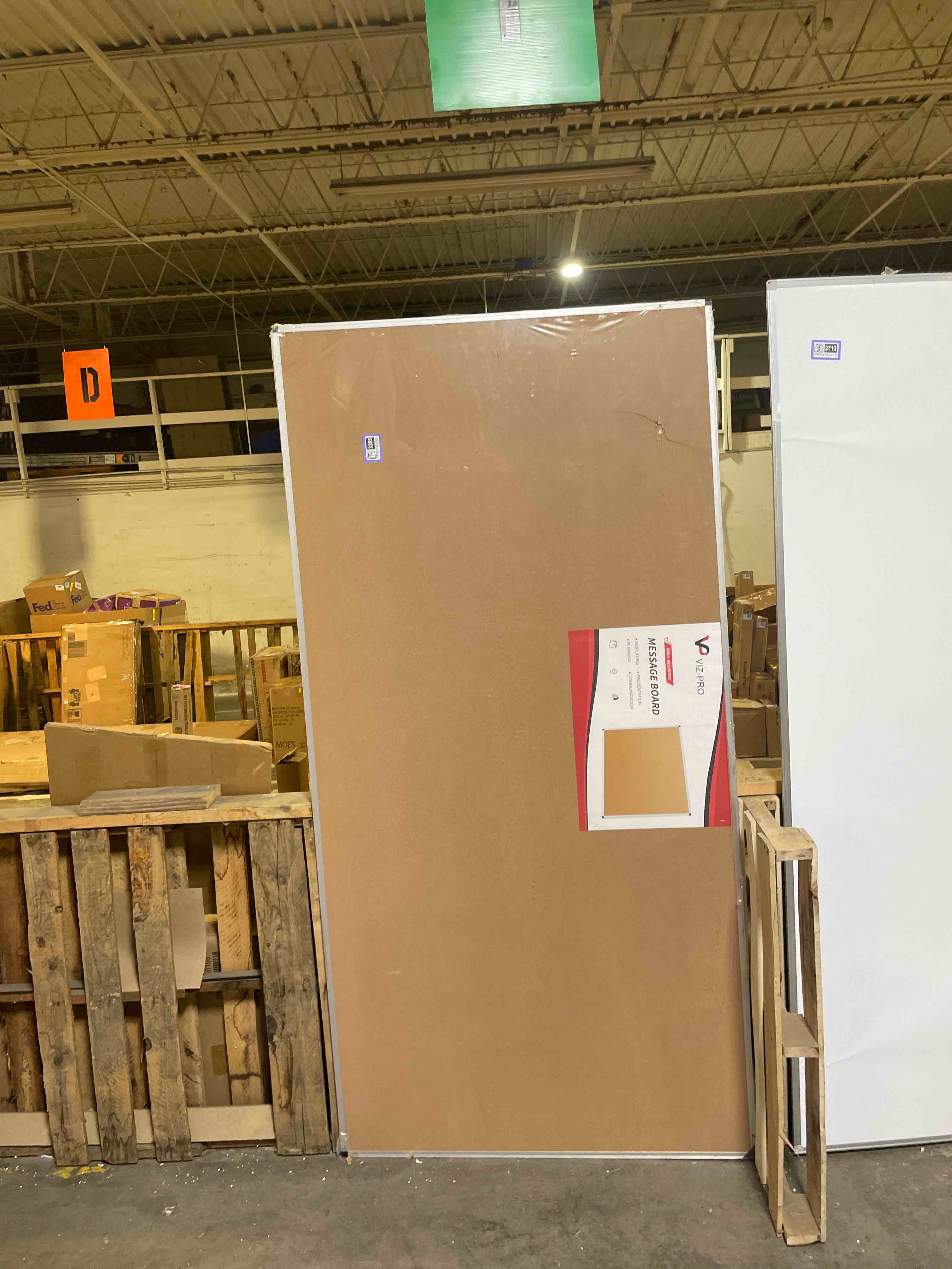 Condition photo showing As Is for viz-pro large cork bulletin board, 96 x 48 inches, wall-mounted corkboard with silver aluminium frame for school, office, and home 8' x 4' (damaged)