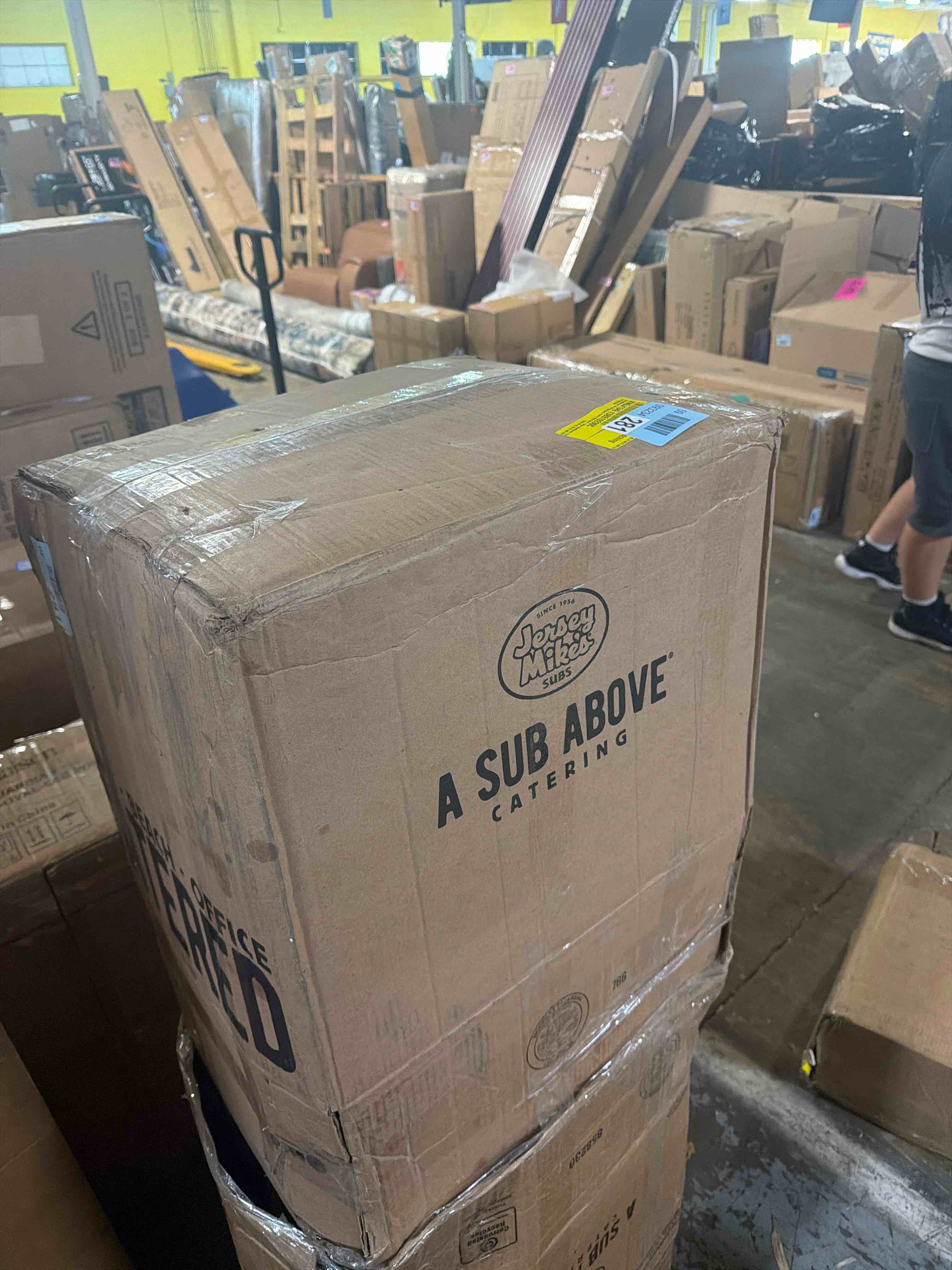 Condition photo showing As Is for upholstered lift storage bed frame with hotel-style headboard, quo  