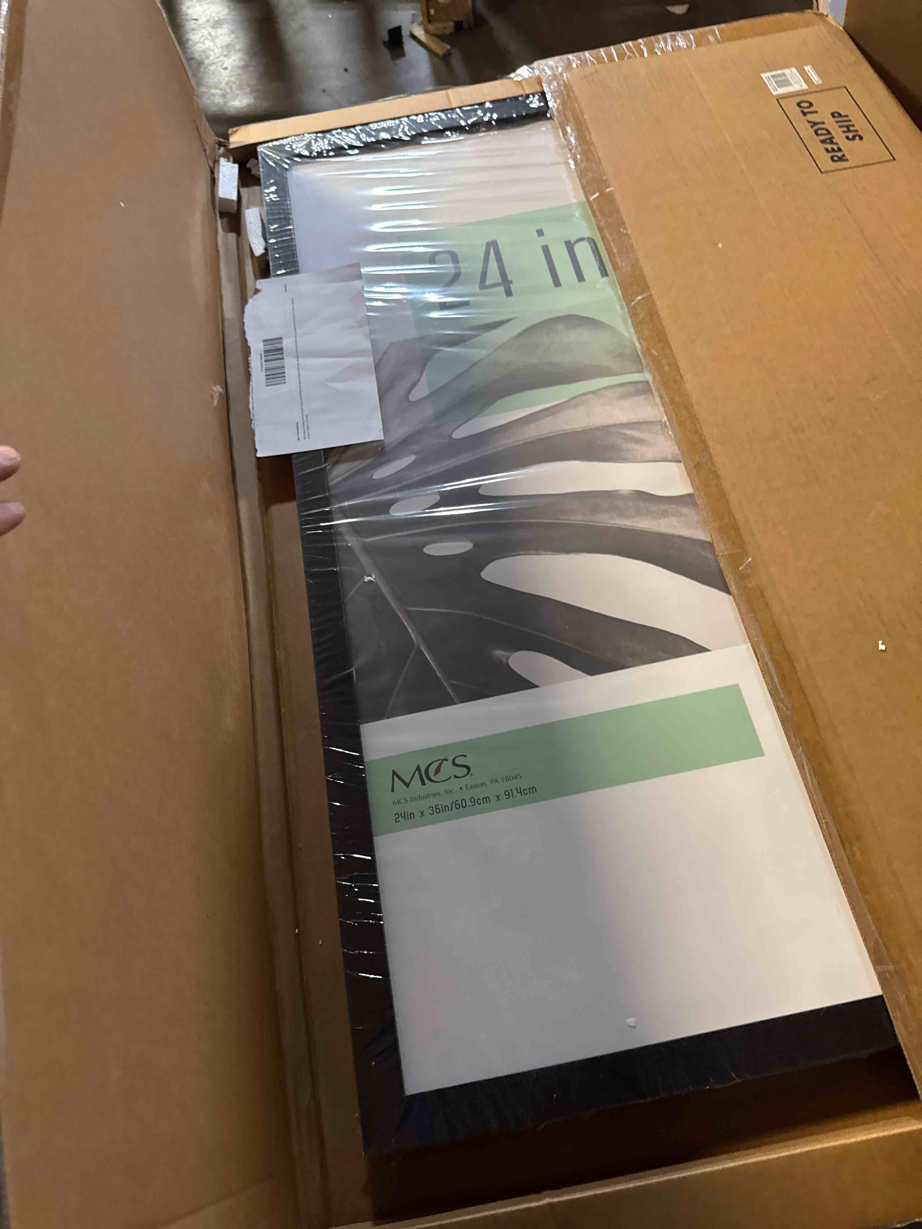 Condition photo showing New/Like New for MCS Studio Gallery 24x36 Poster Frame Black Woodgrain, Vertical & Horizontal Wall Hanging Large Picture Frame for Photos, Posters & Art Prints (1-Pack)