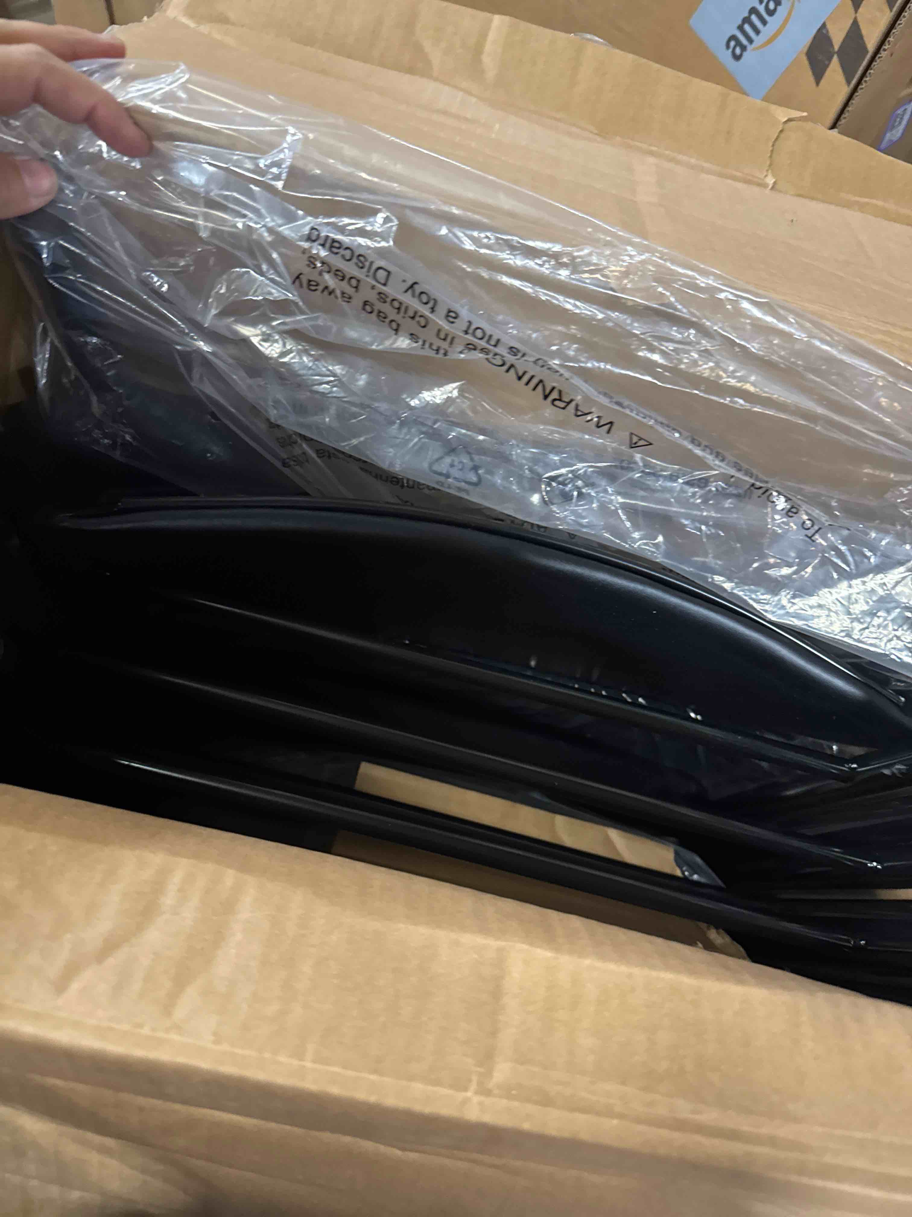 Condition photo showing New/Like New for Amazon Basics Vinyl-Padded Metal Steel Folding, Black, 4-Pack Chair