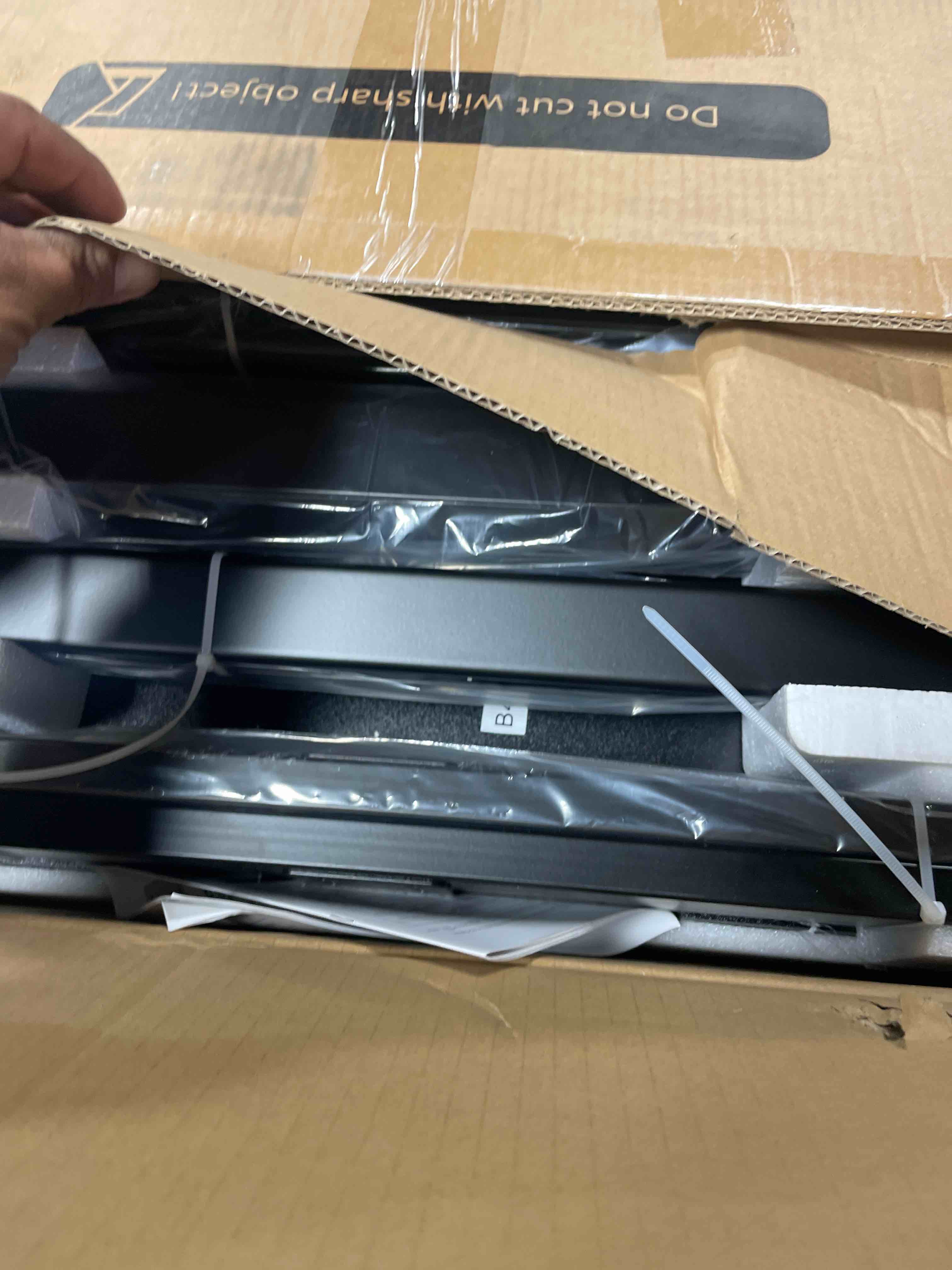 Condition photo showing New/Like New for Huuger 55 x 28 Large Electric Standing Desk, Height Adjustable Computer Desk, 27.6" Deep Desktop, Stand up Gaming Office Table with 2 Hooks, 3 Preset Heights, for Home Office, Black