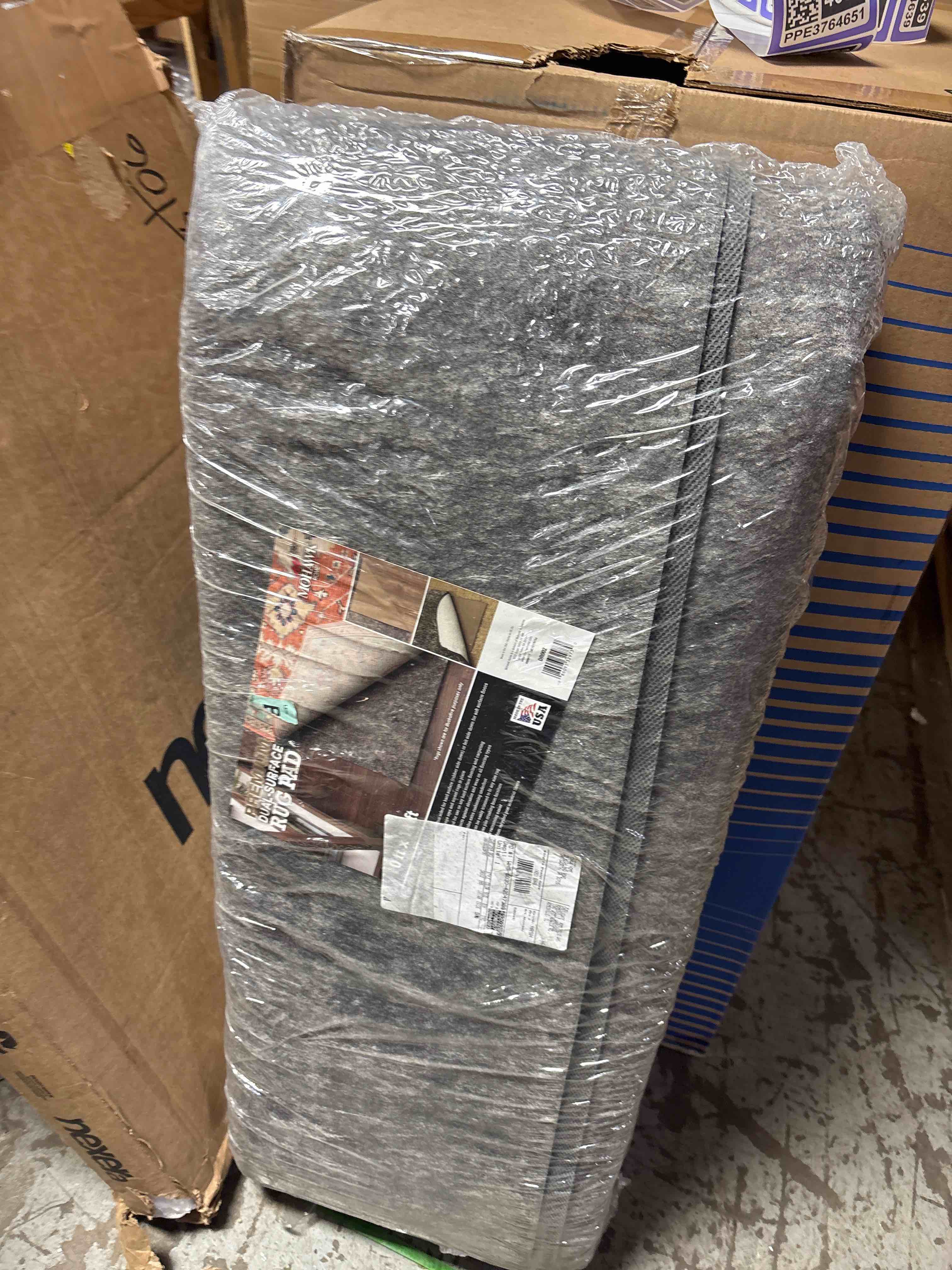 Condition photo showing New/Like New for mohawk home non slip rug pad 1/4" thick felt + latex rubber gripper - dual surface cushion for hardwood, carpet, tile floors, made in usa - 10' x 14' 1/4 inch dual surface rug pad 10' x 14' (rectangular)