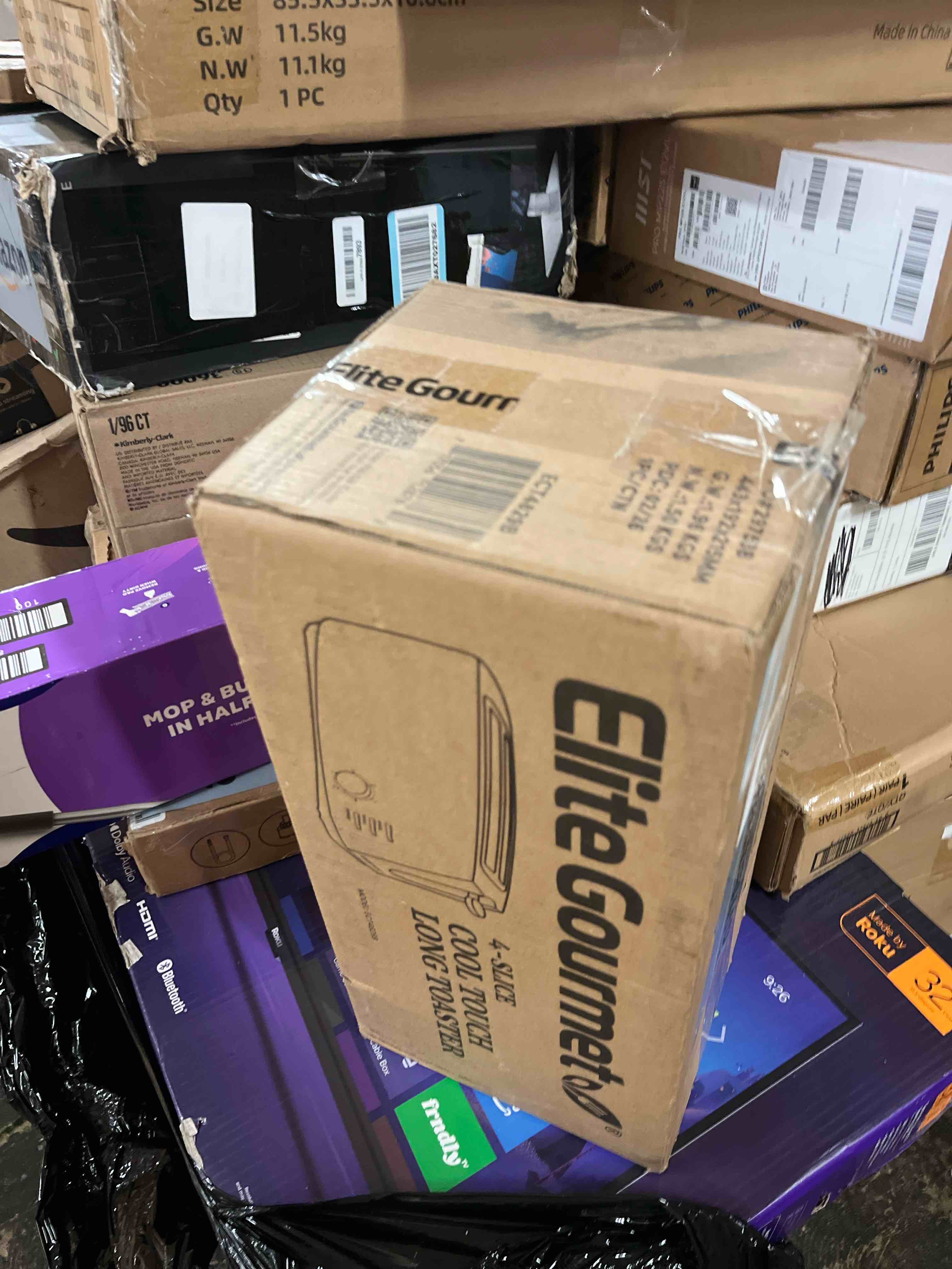 Condition photo showing New/Like New for elite gourmet ect4829b long slot 4 slice toaster, 6 toast settings toaster defrost, reheat, cancel functions, slide out crumb tray, extra wide slots for bagels waffles, black
