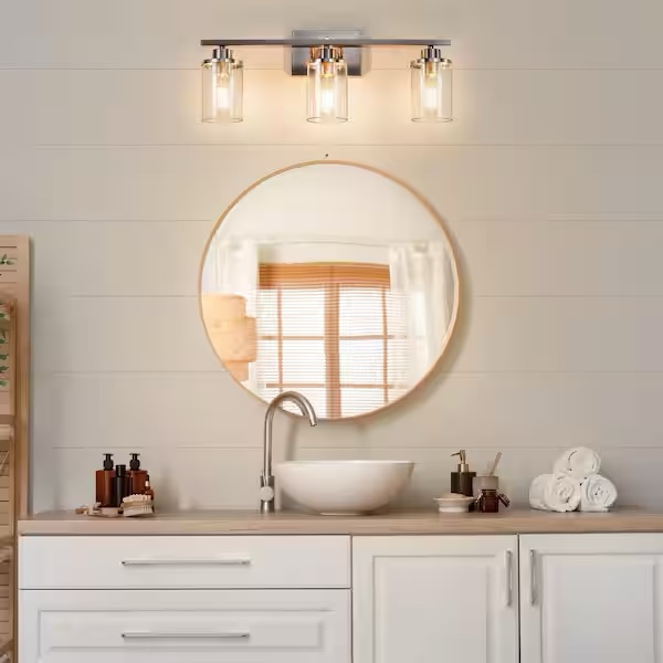 Condition photo showing New/Like New for edishine 24 in. 3-light brushed nickel vanity light with clear glass shade