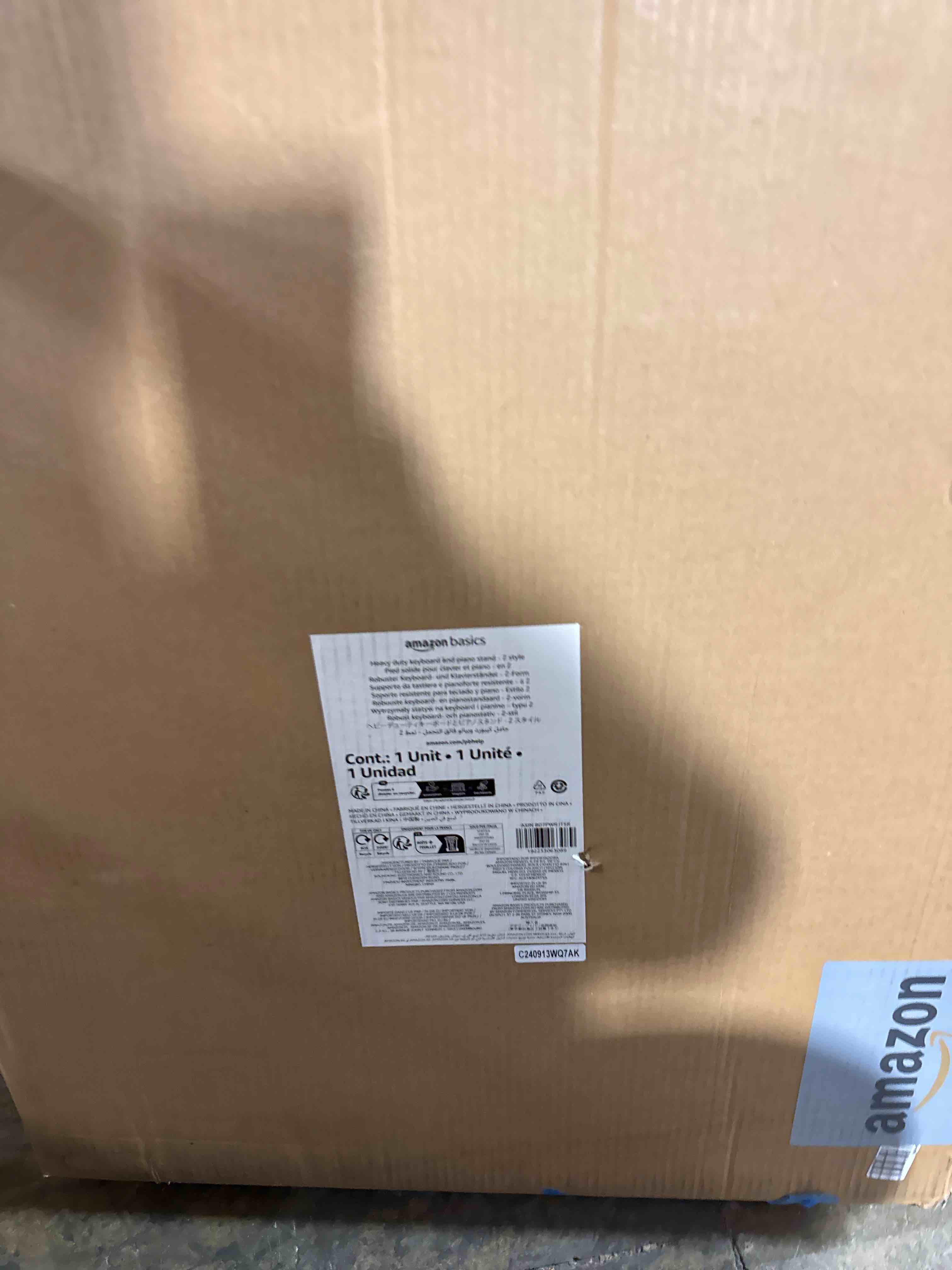 Condition photo showing New/Like New for Amazon Basics Fixed Height Keyboard and Piano Stand, Portable Z-Shape - For Compact Space, Carpet Stability & More Legroom, Black