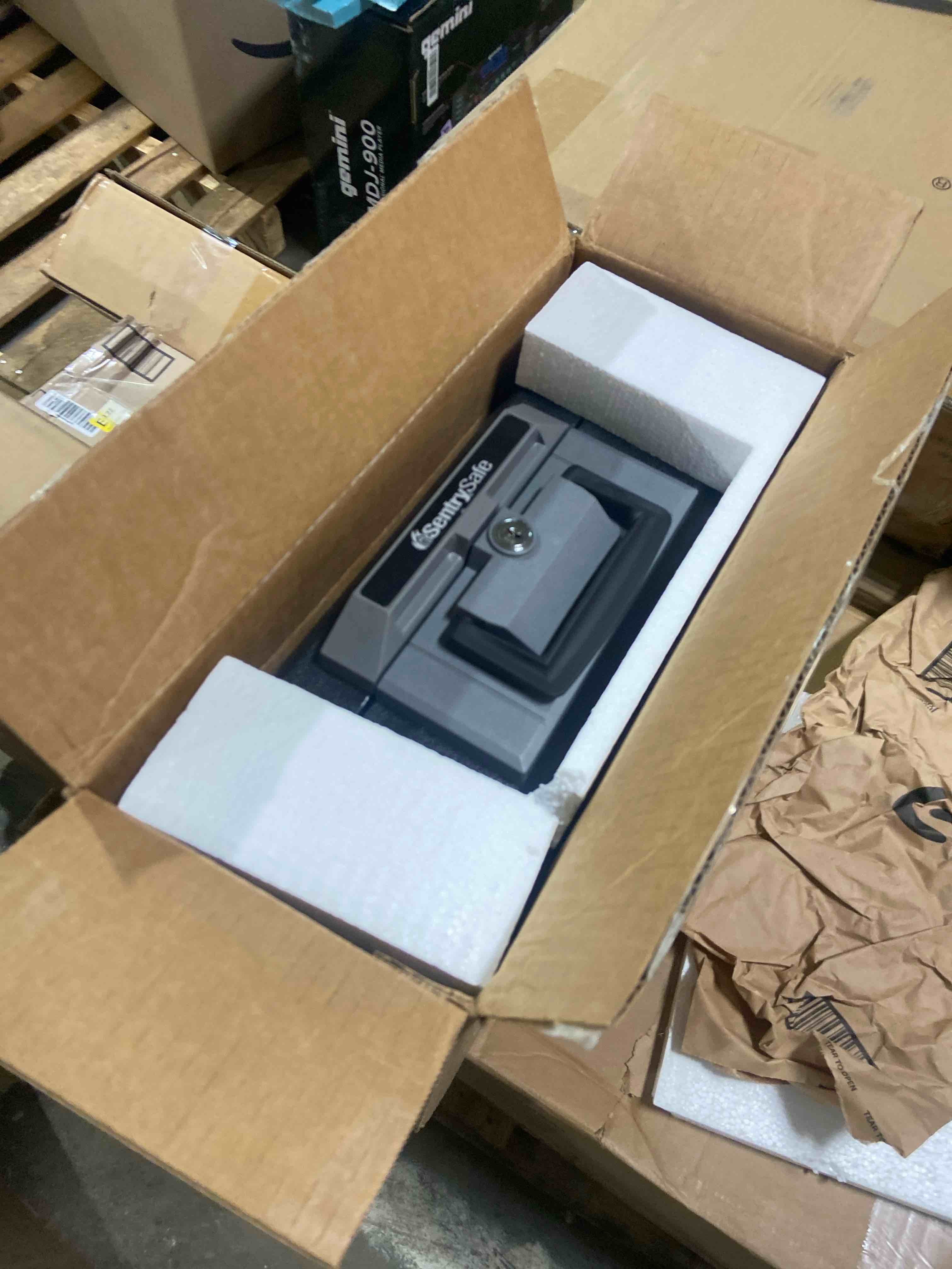 Condition photo showing New/Like New for SentrySafe Fireproof Safe Box with Key Lock, Chest Safe with Carrying Handle to Secure Money, Jewelry, Documents, 0.25 Cubic Feet, 6.3 x 15.3 x 12.1 Inches, 1160 Fire resistant box 0.25 cu. ft.