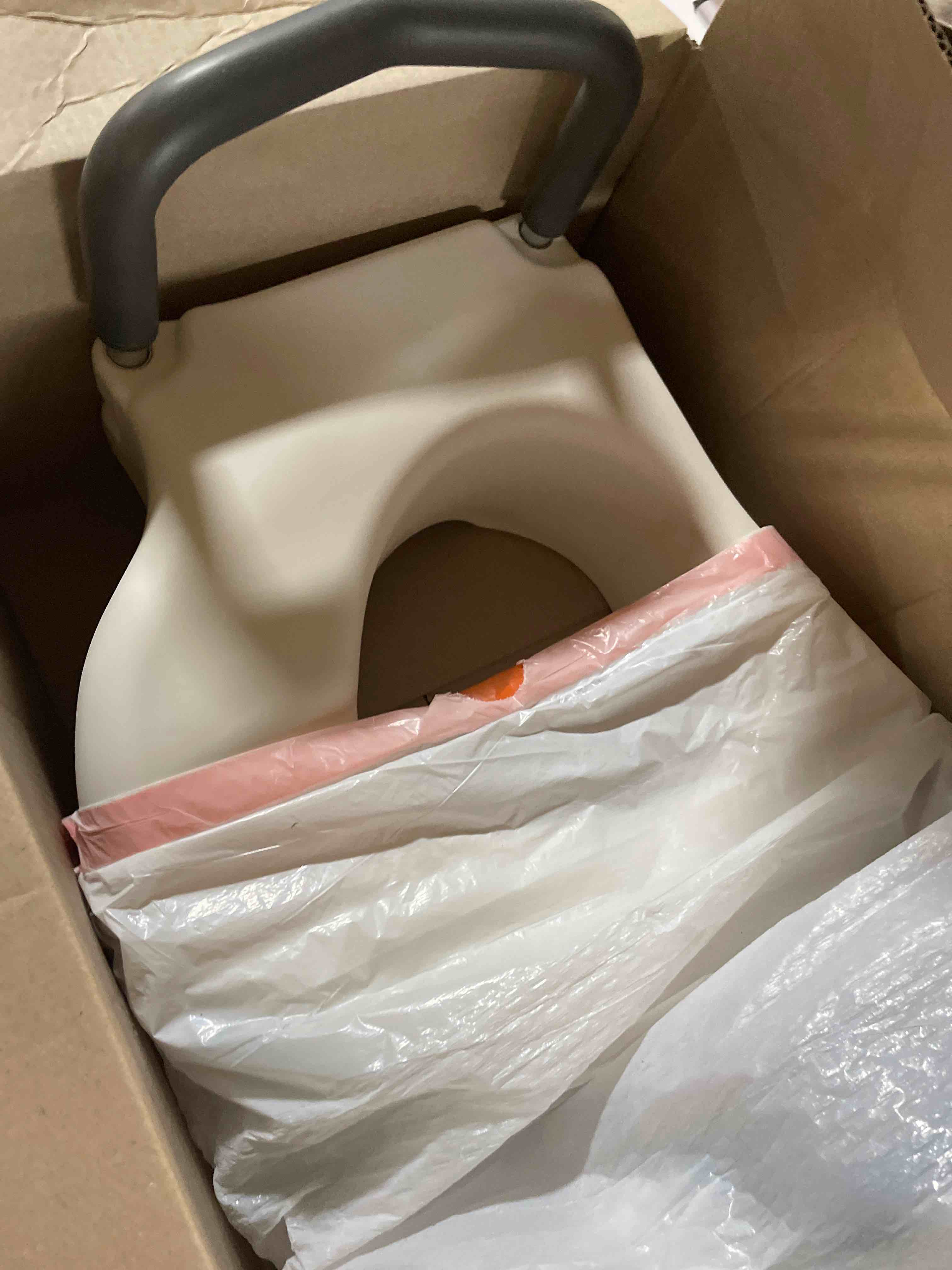 Condition photo showing As Is for Medline 5" Elongated Raised Toilet Seat, with Lock and Removable Padded Arms- A Medical Seat for Seniors, Elderly, Adults, or Post-Surgery Recovery, 1 Ct.