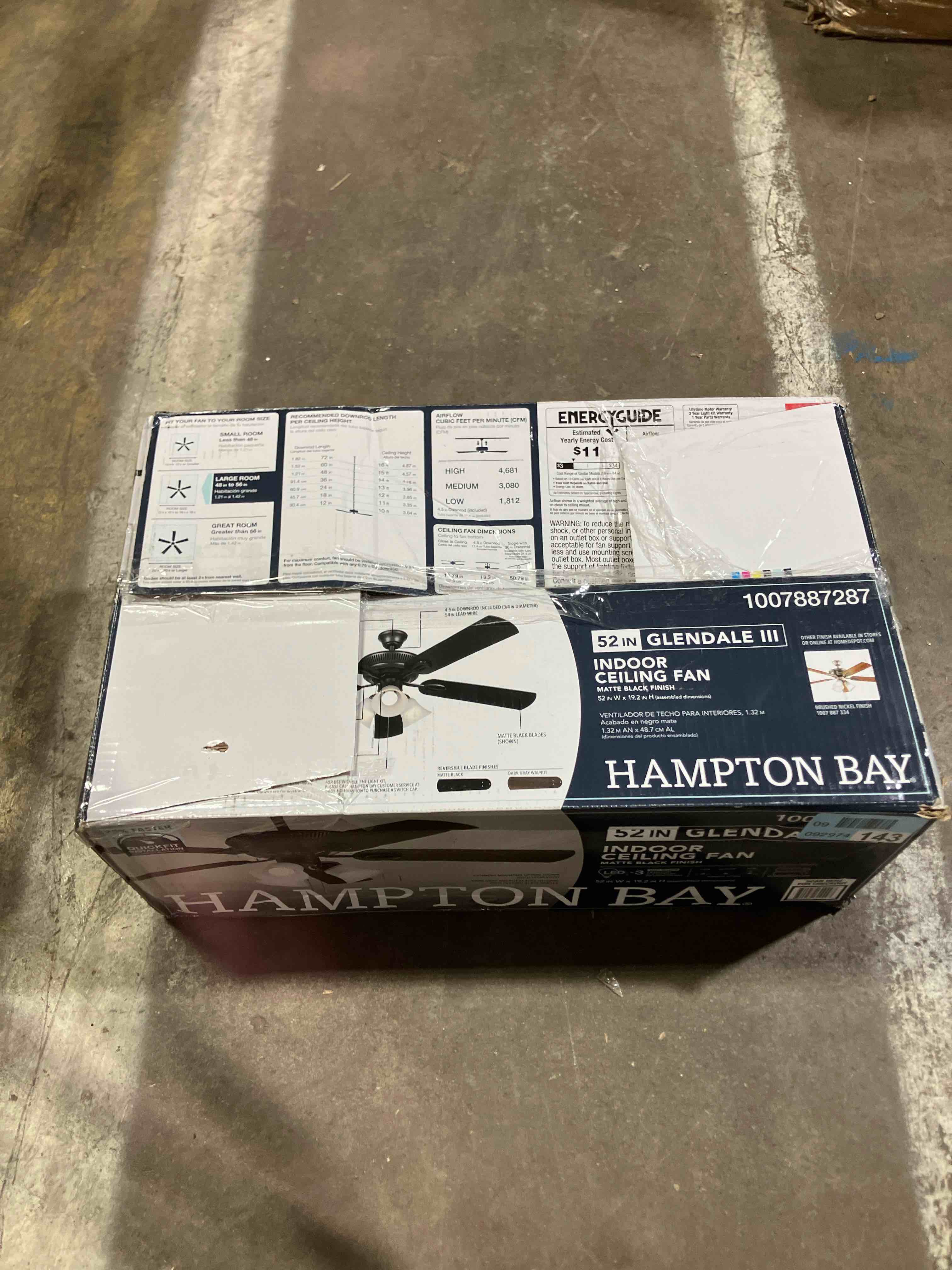 Condition photo showing As Is for Hampton Bay 52in Matte Black Indoor Ceiling Fan (missing hardware)