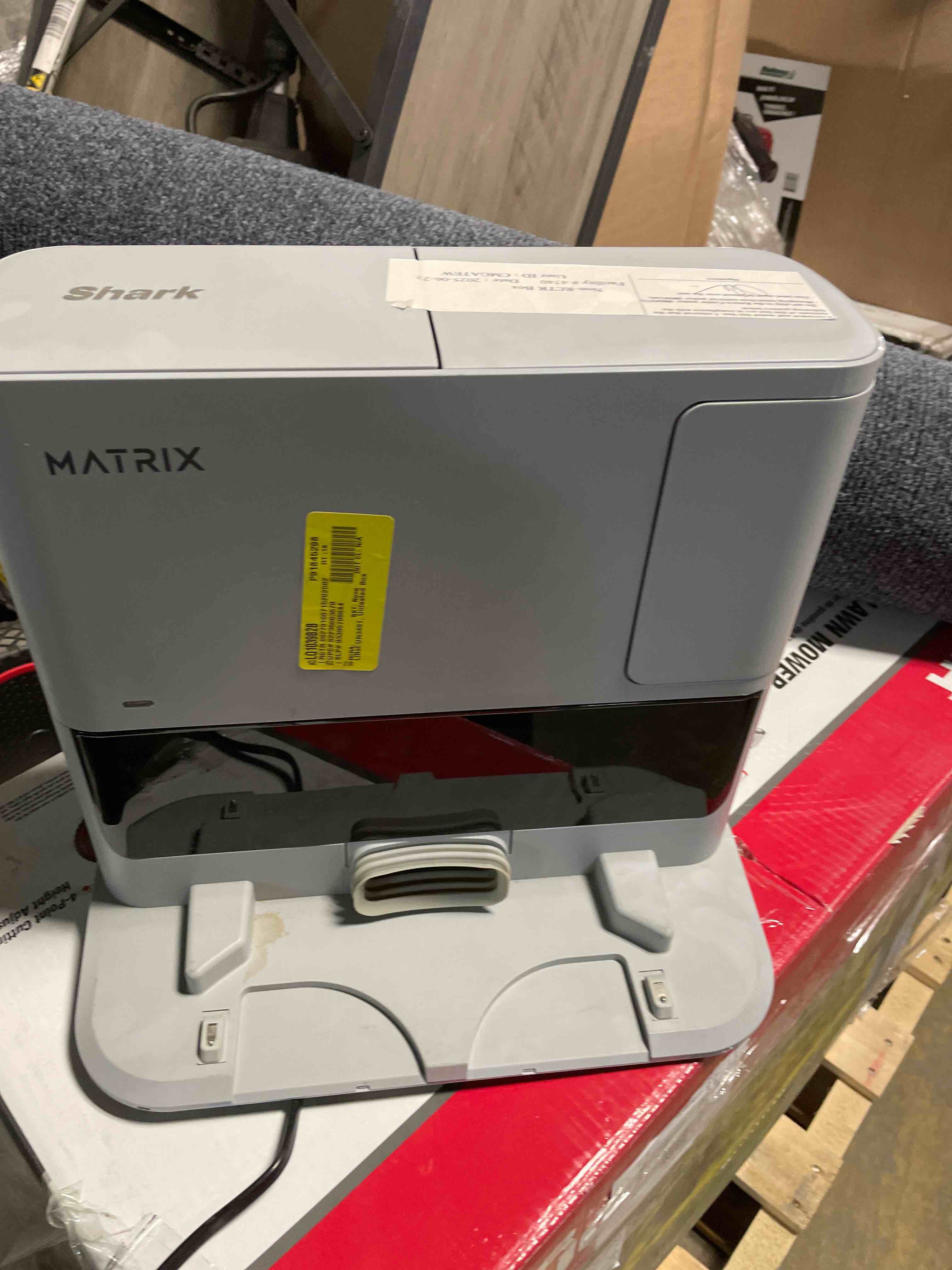 Condition photo showing As Is for Shark RV2300S Matrix Self-Empty Robot Vacuum with No Spots Missed on Carpets & Hard Floors, Bagless 30 Day Capacity Base, Precision Home Mapping Perfect for Pet Hair, Wi-Fi, Black/Grey (Renewed)