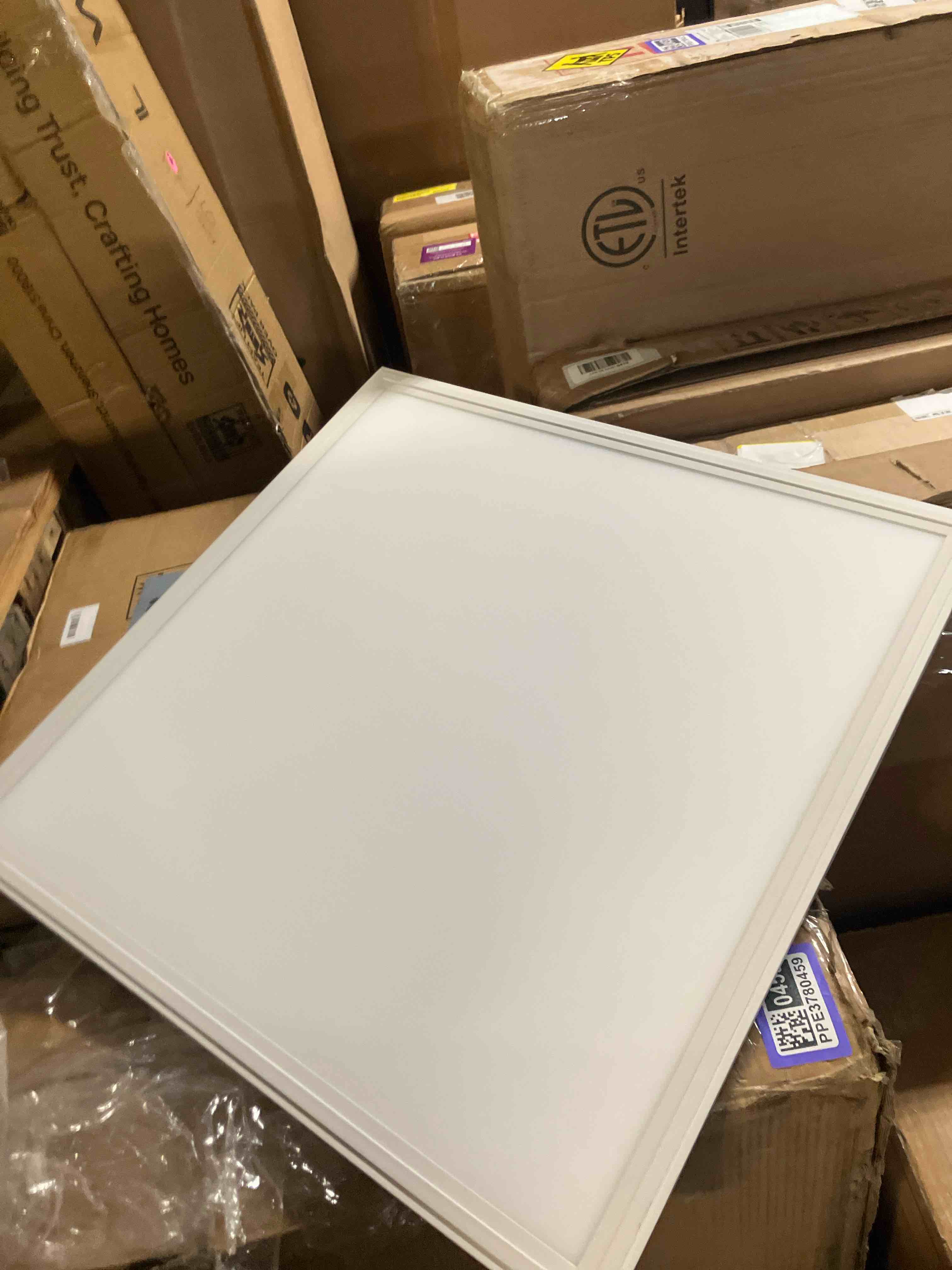 Condition photo showing As Is for Lithonia Lighting CPANL 2x2 LED Flat Panel Light, 2 ft. by 2 ft. LED Light Panel, Ceiling Lighting Fixture, 3300 Lumens, 3500K/4000K/5000K Switchable CCT, Includes Direct Ceiling Mount Bracket, White 2-Foot X 2-Foot 3300 Lumens Switchable White