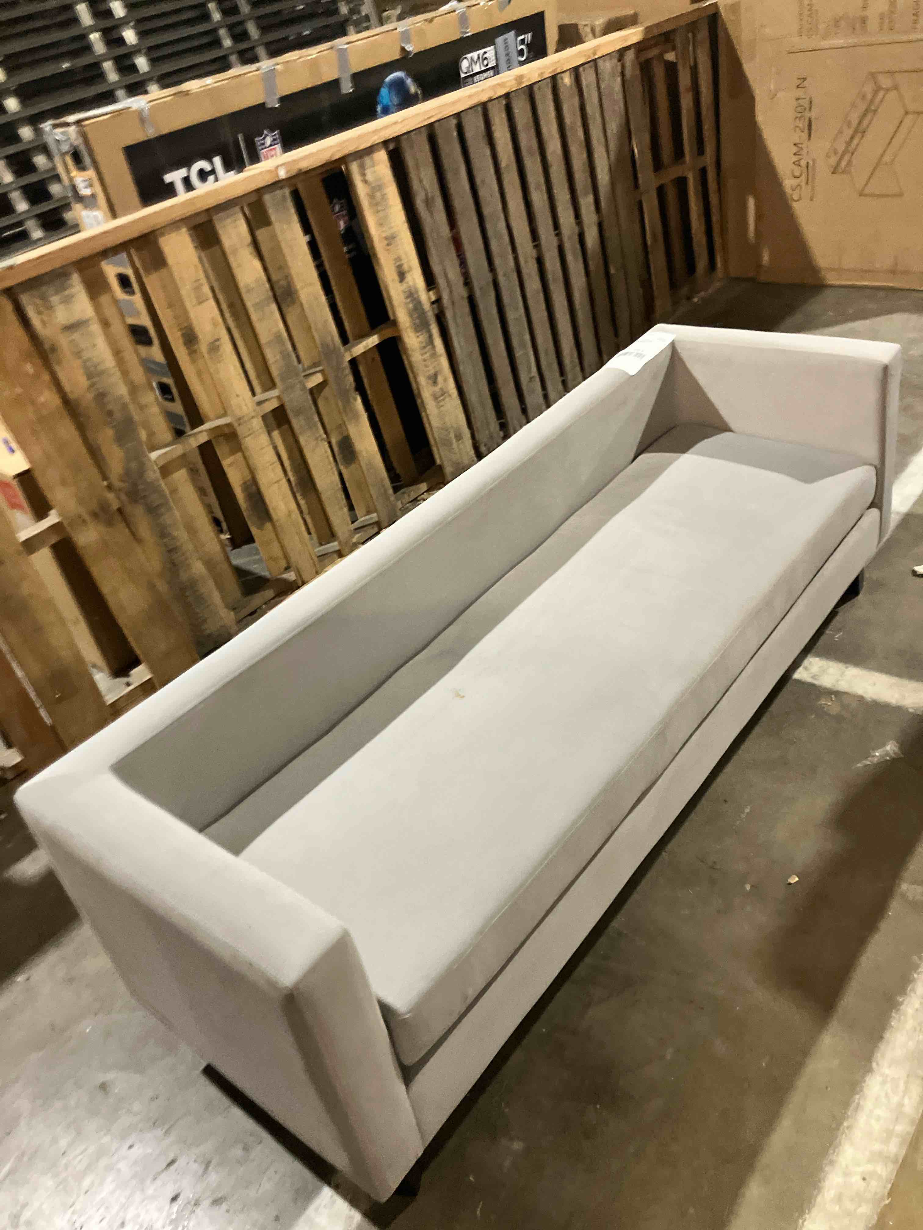 Condition photo showing Good Condition for LAKIQ Modern Upholstered Bedroom Bench with Arms and Low Back Faux Leather Ottoman Sofa Couch Wooden Frame Bench Seating for Bedroom Living Room (47" L x 20" W x 20" H) ( Has damaged to back of couch)