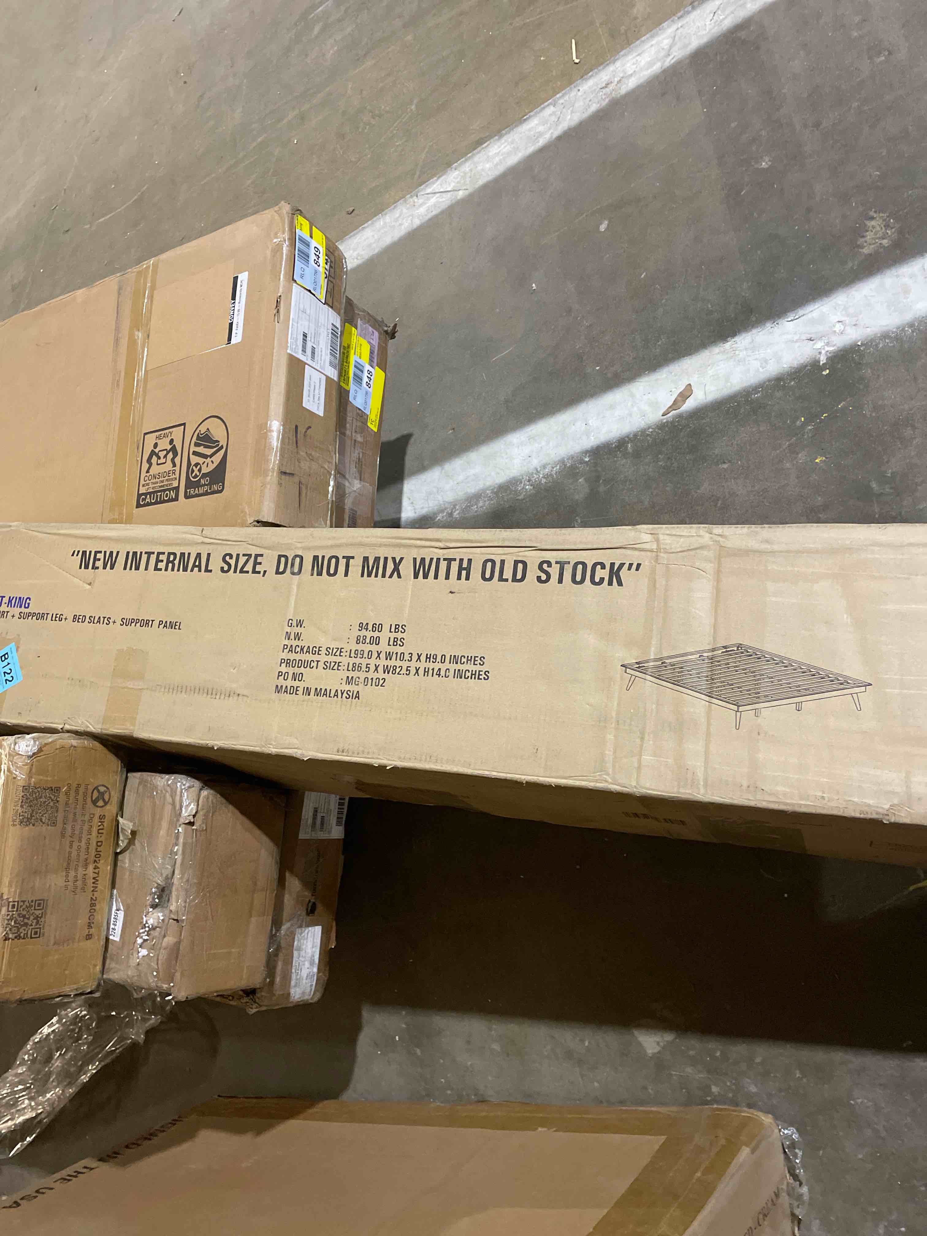 Condition photo showing New/Like New for Baxton Studio Karine Mid-Century Wood King Platform Bed in Walnut Brown