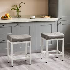 Michille Saddle Upholstered 24.21" Counter Stool (Set of 2)