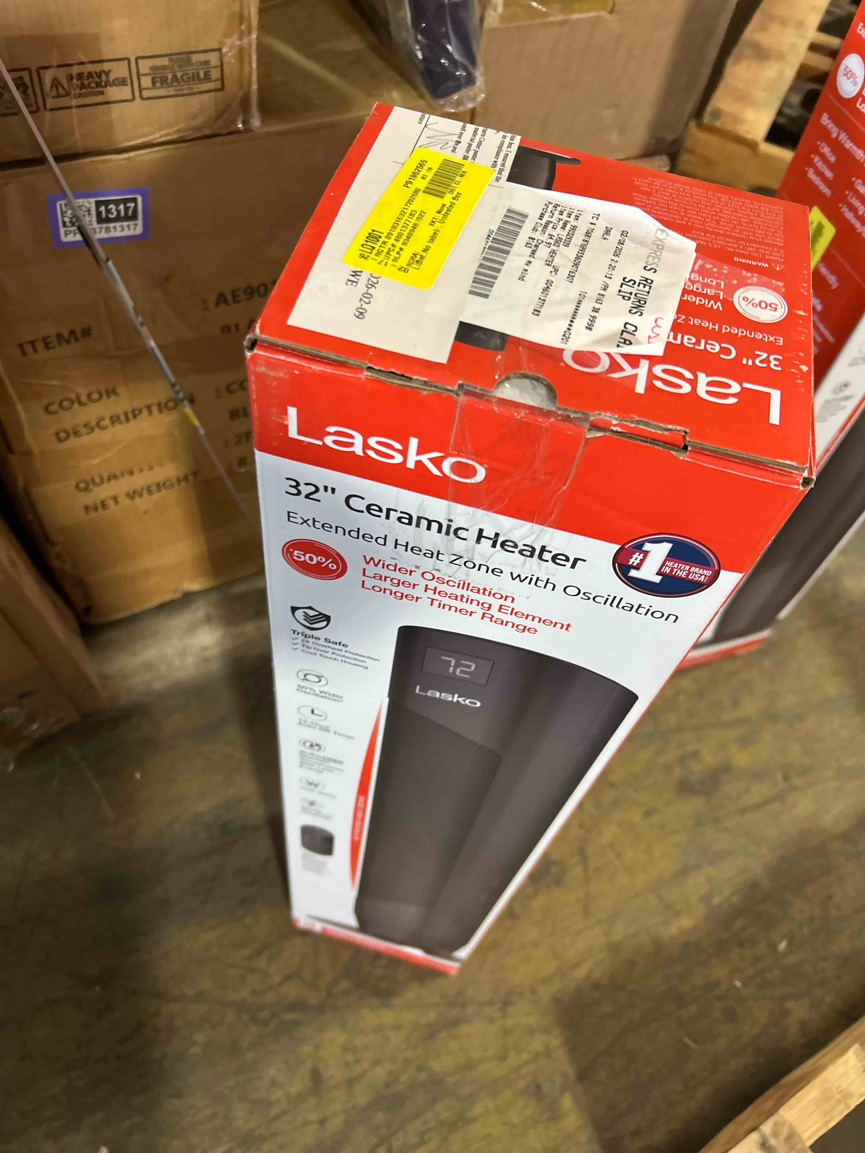 Condition photo showing New/Like New for Lasko 32" Oscillating Ceramic Tower Space Heater. 