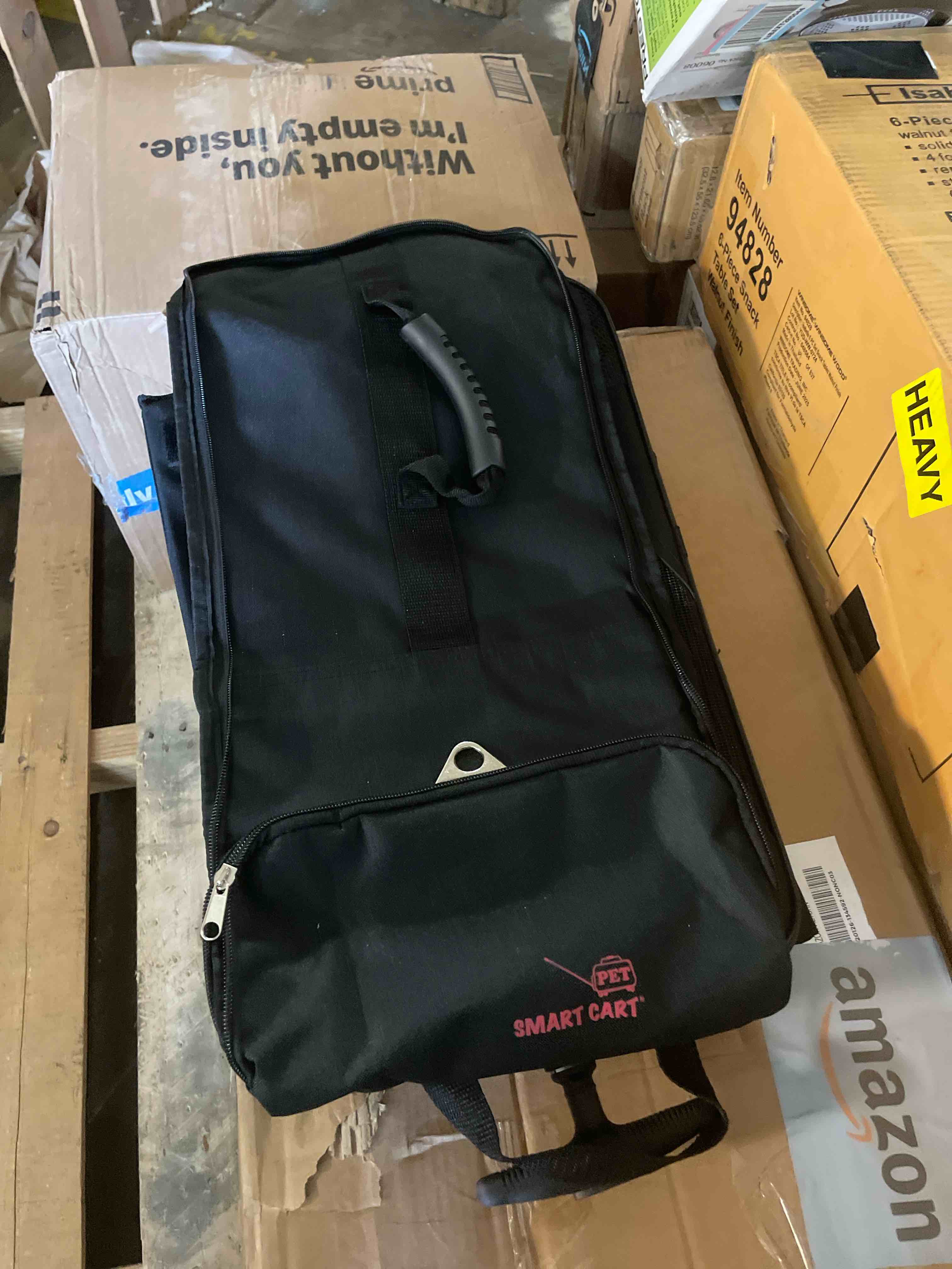 Condition photo showing Good Condition for dbest products Smart Cart Pet Carrier with Wheels, Airline Approved Dog and Cat Carrier with Telescoping Handle, 21x12x12in, 24 lb Capacity, Black Carrier on wheels 21.0"L x 12.0"W x 12.0"H Black