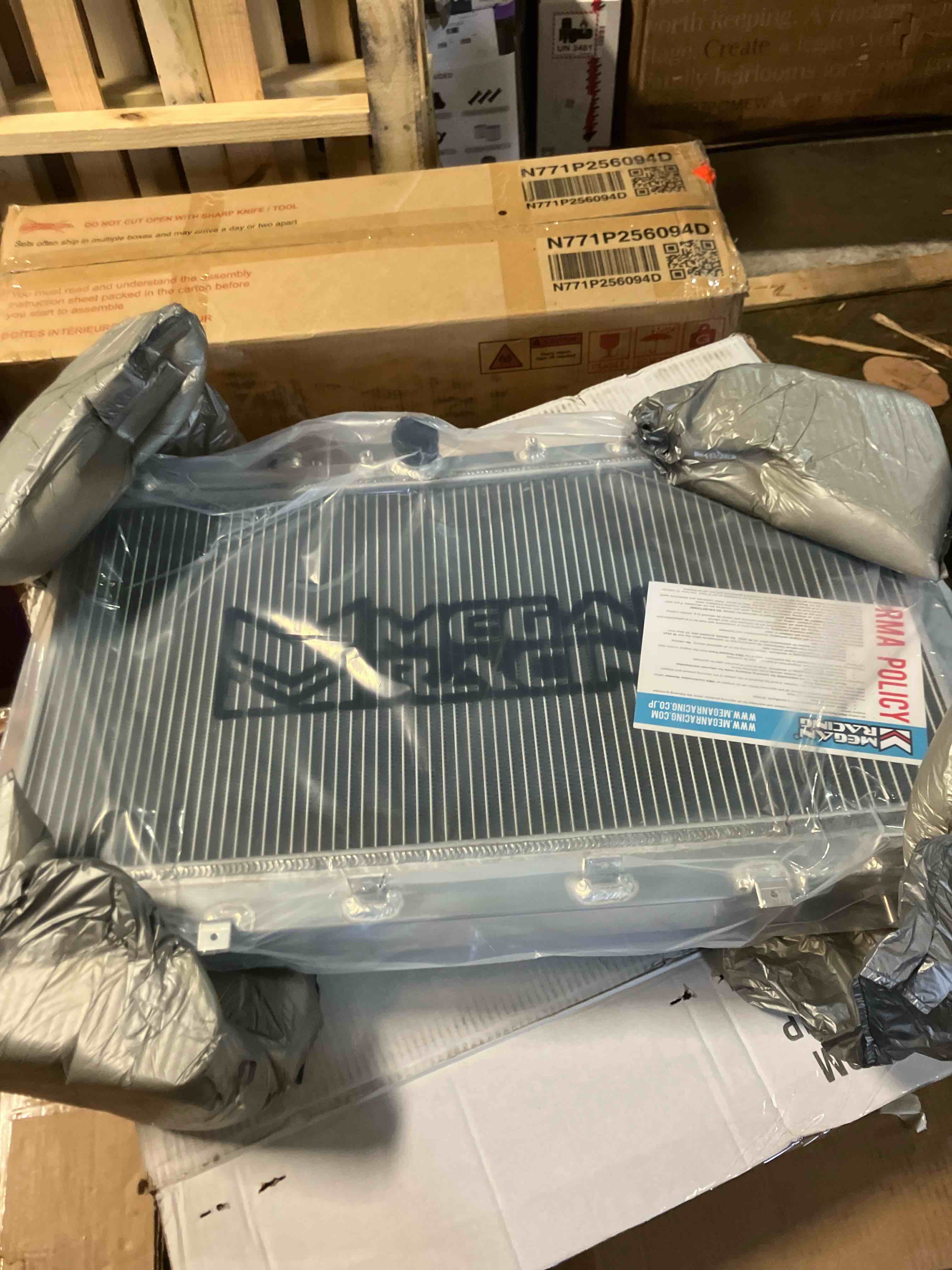 Condition photo showing New/Like New for Megan MR-RT-ATSX04 Aluminum Silver Direct Bolt-On Front Radiator (AT/MT)