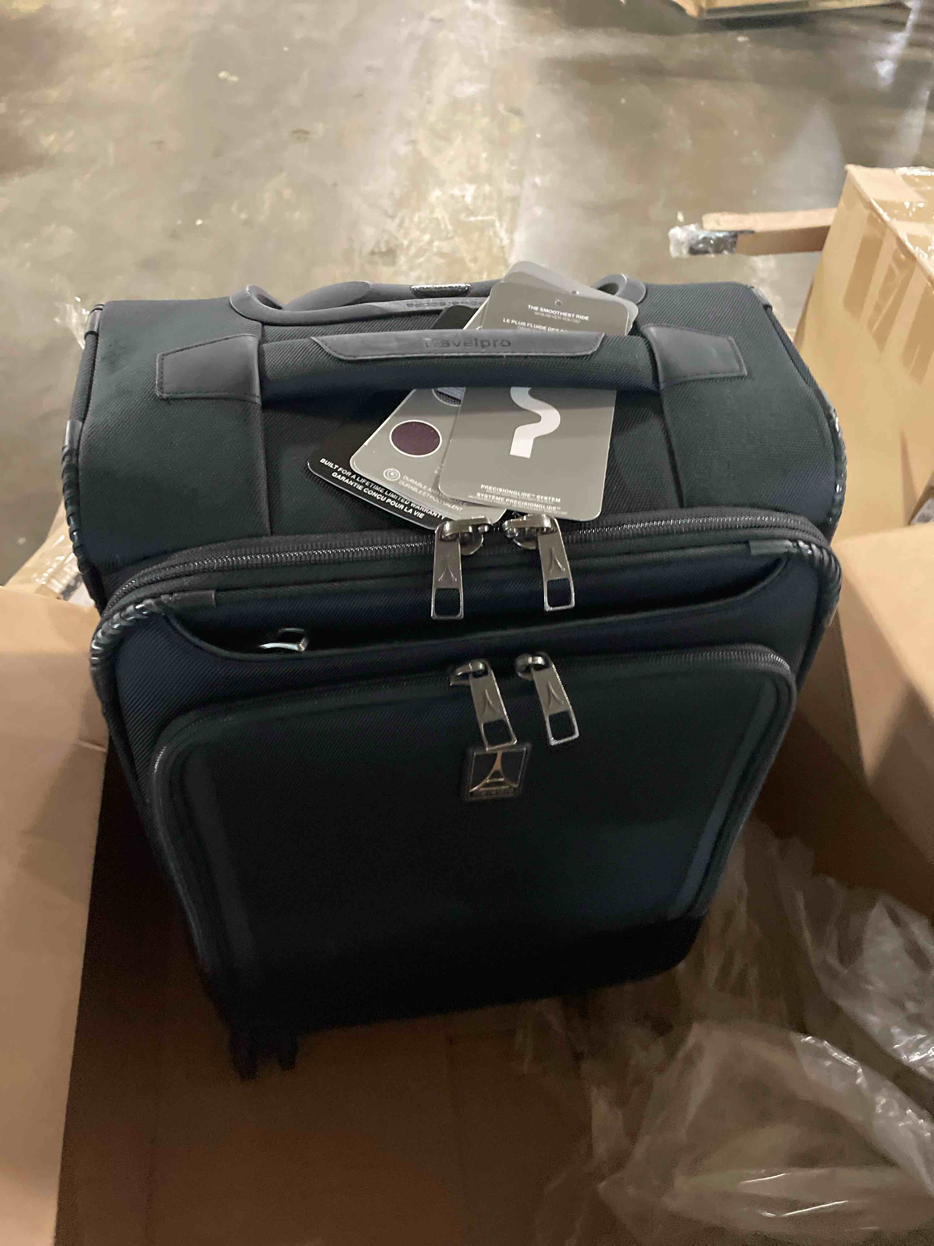 Condition photo showing Good Condition for Travelpro Maxlite 5 Softside Expandable Luggage with 4 Spinner Wheels, Lightweight Suitcase, Men and Women, International, Black, Carry-on 21-Inch Carry-on 21-Inch Black